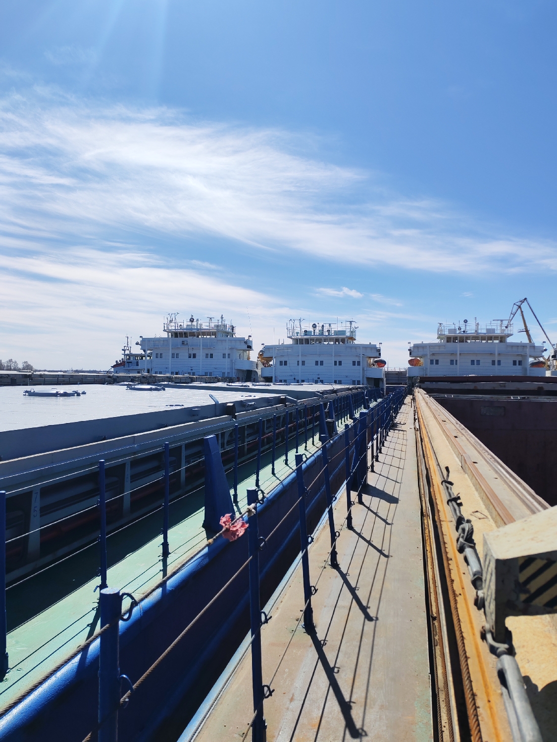 Maritime worker documents vessel operations at Rybinsk port
