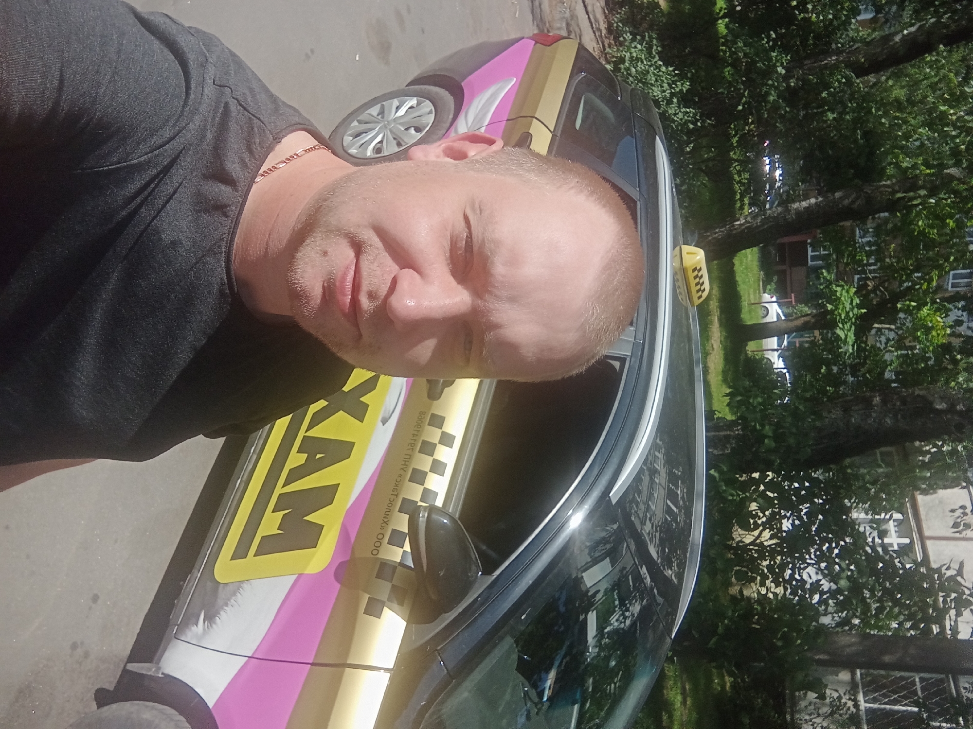 MAXLINE taxi parked in Mahilyow, mixed with screen-captured media content