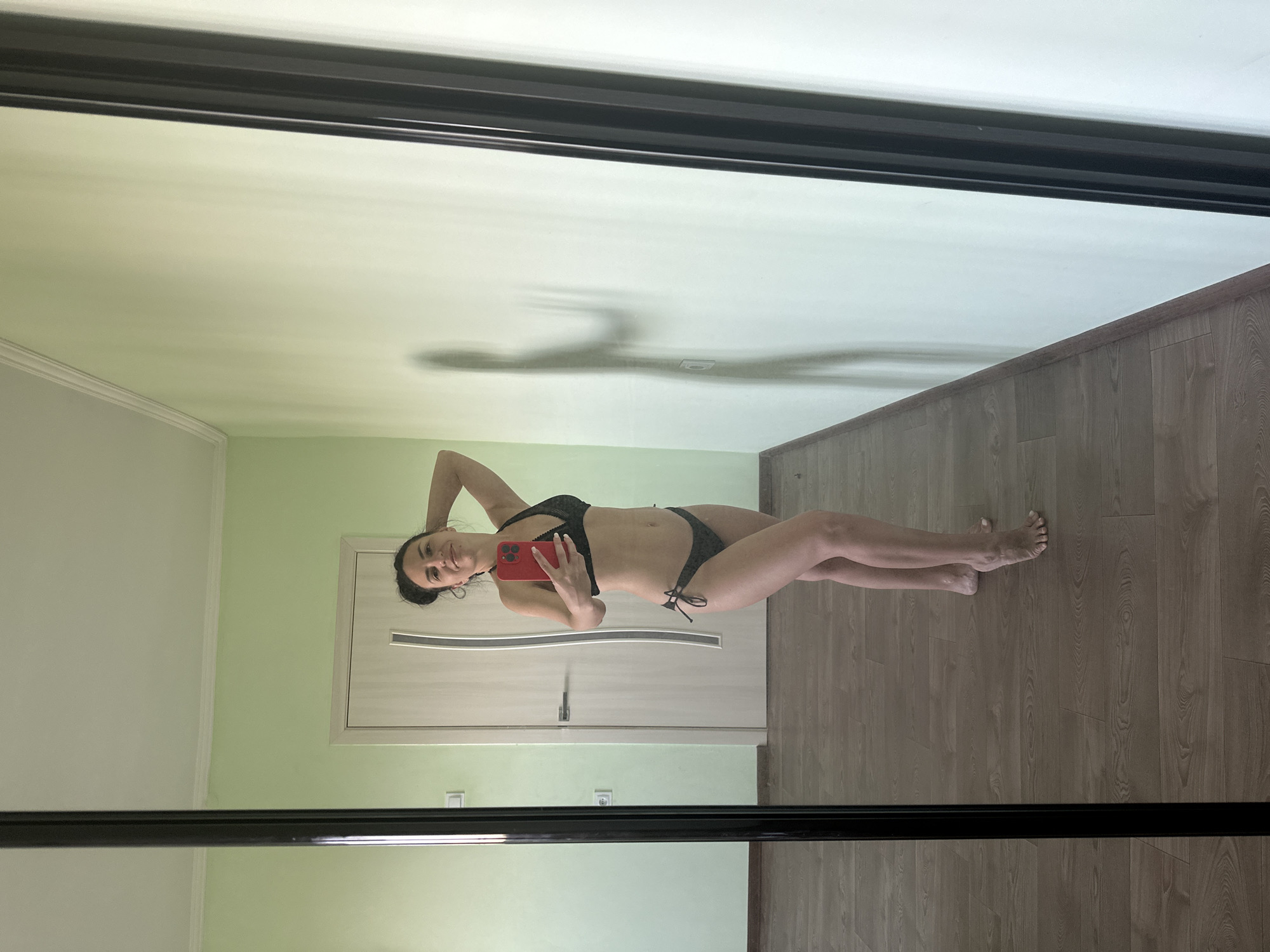 Mirror selfie in a bedroom, black bikini, Odesa