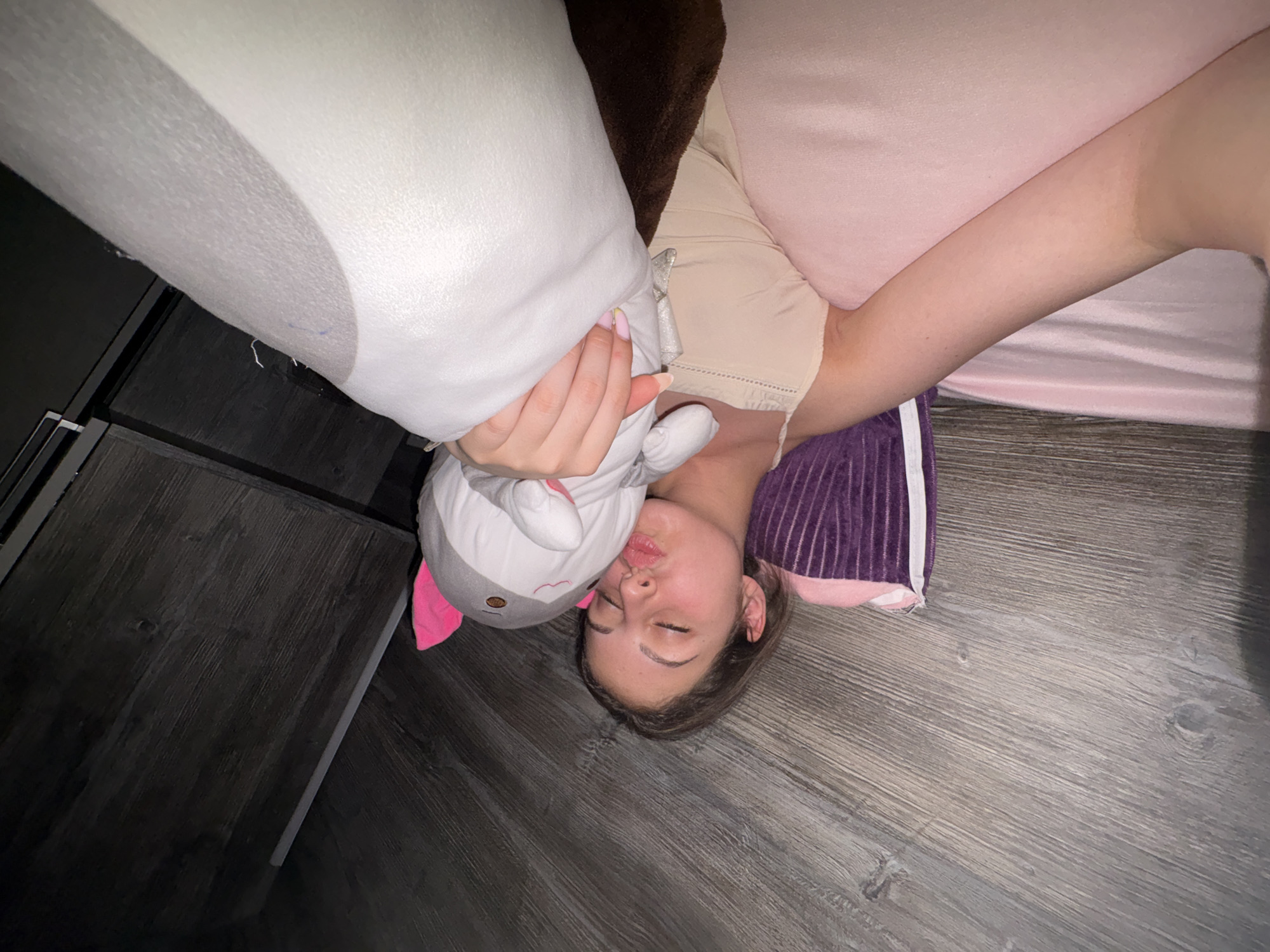Woman photographed resting indoors during evening in Bulgarovo, Bulgaria