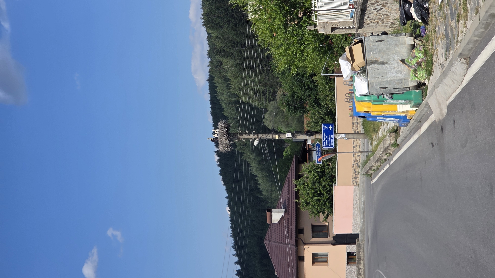 Midday walk through a quiet village on a clear day