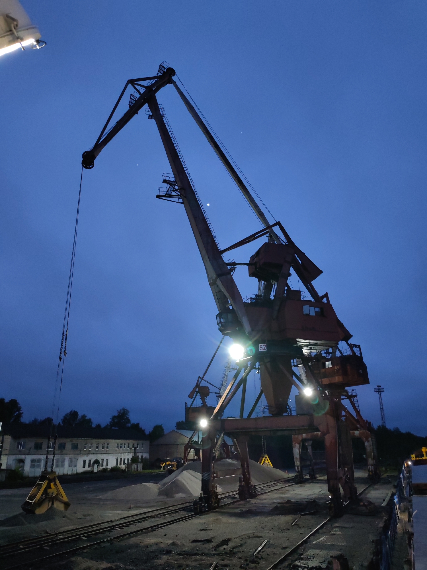 Evening port operations documented in Medvezhyegorsk, Russia
