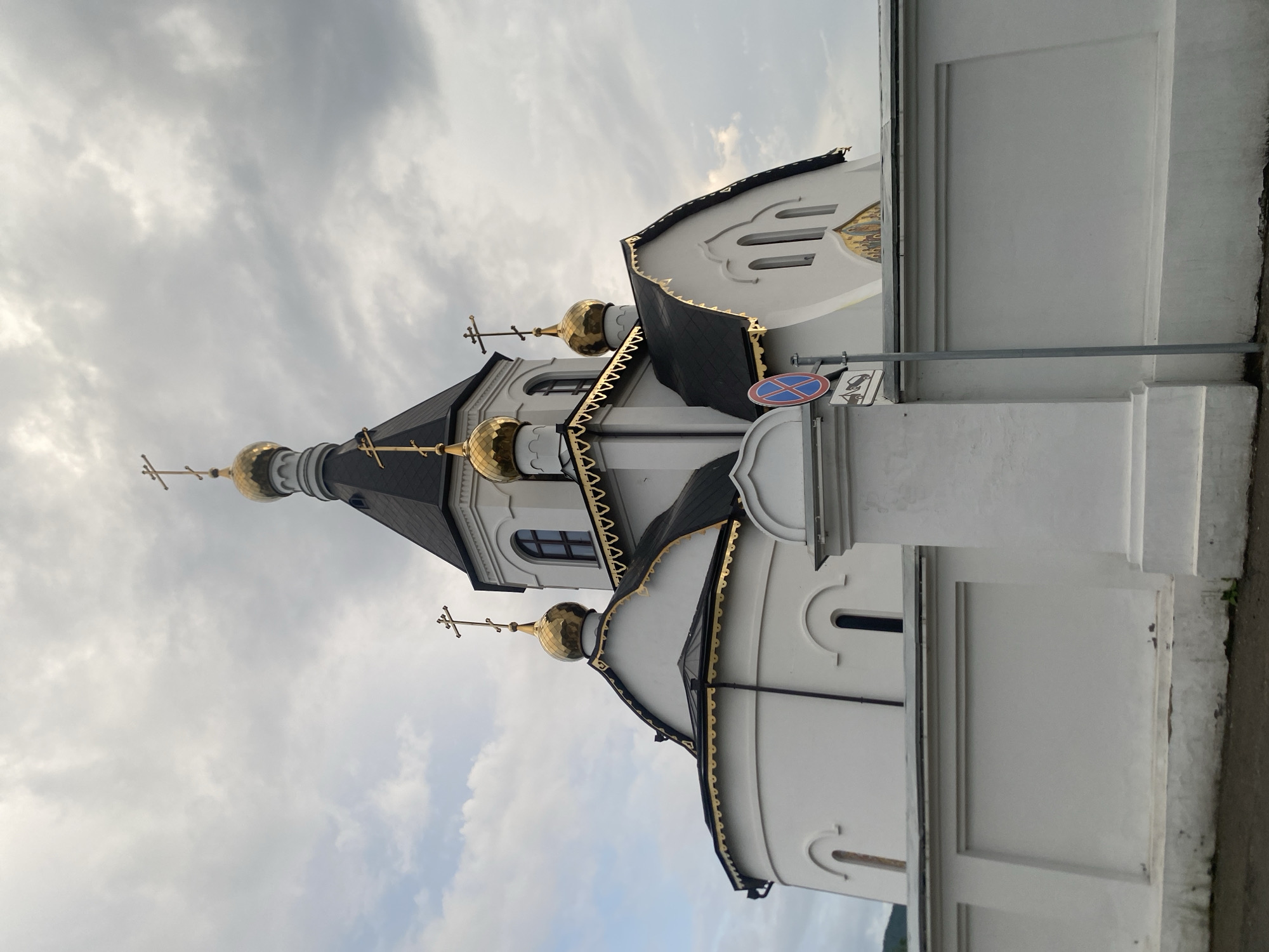 Orthodox church and traditional wooden architecture in Krasnoyarsk