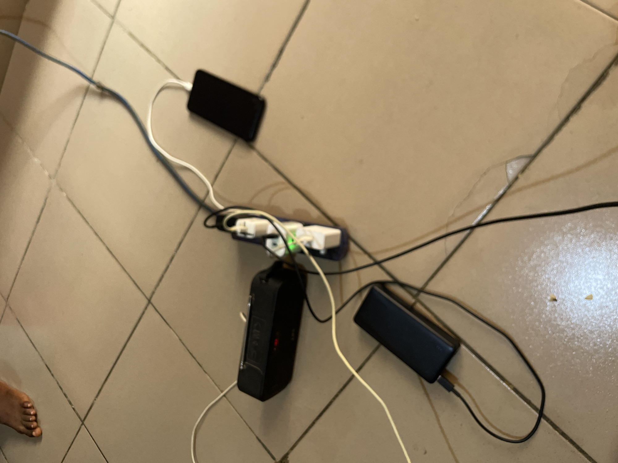 Electronic devices charging, interior scenes captured in Jos area