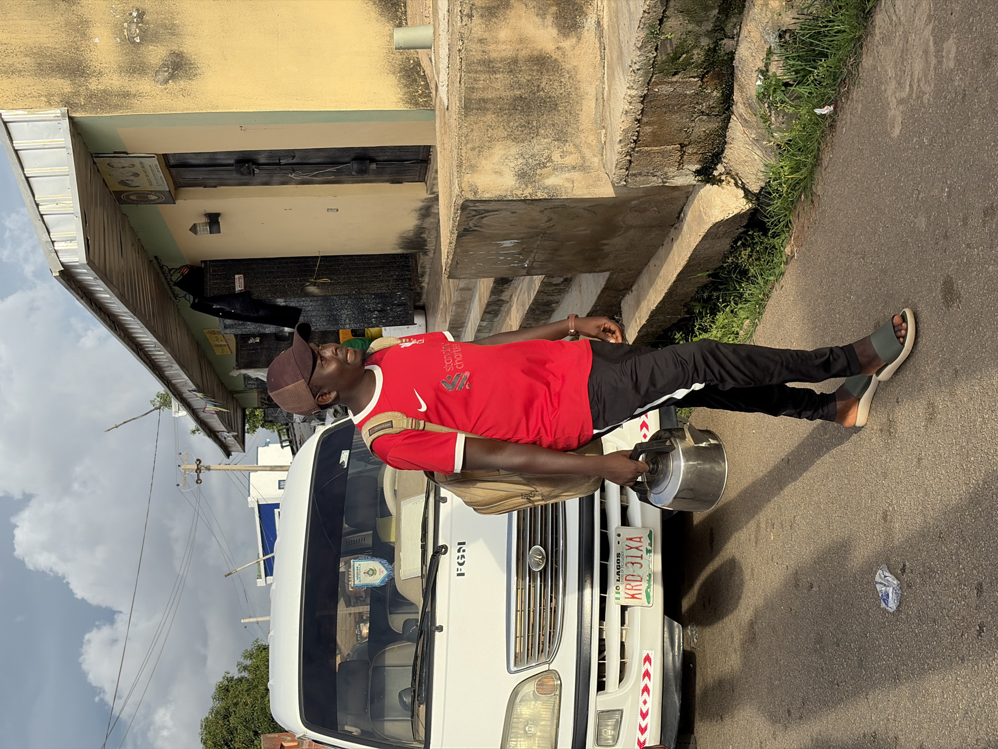 Ordinary street life documented across Jos, Nigeria neighborhoods