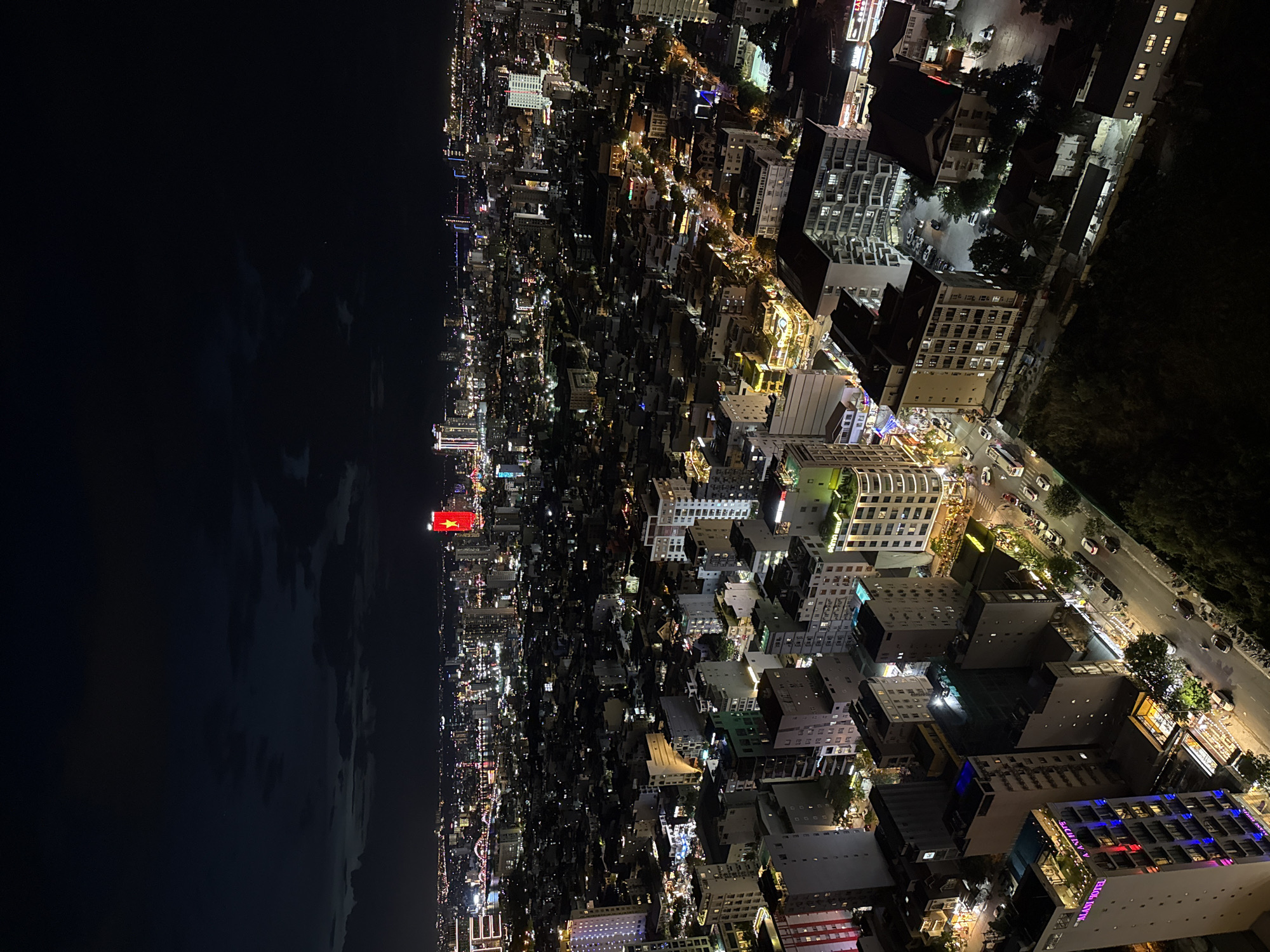 Nighttime aerial views capture bustling Đà Nẵng cityscape activity