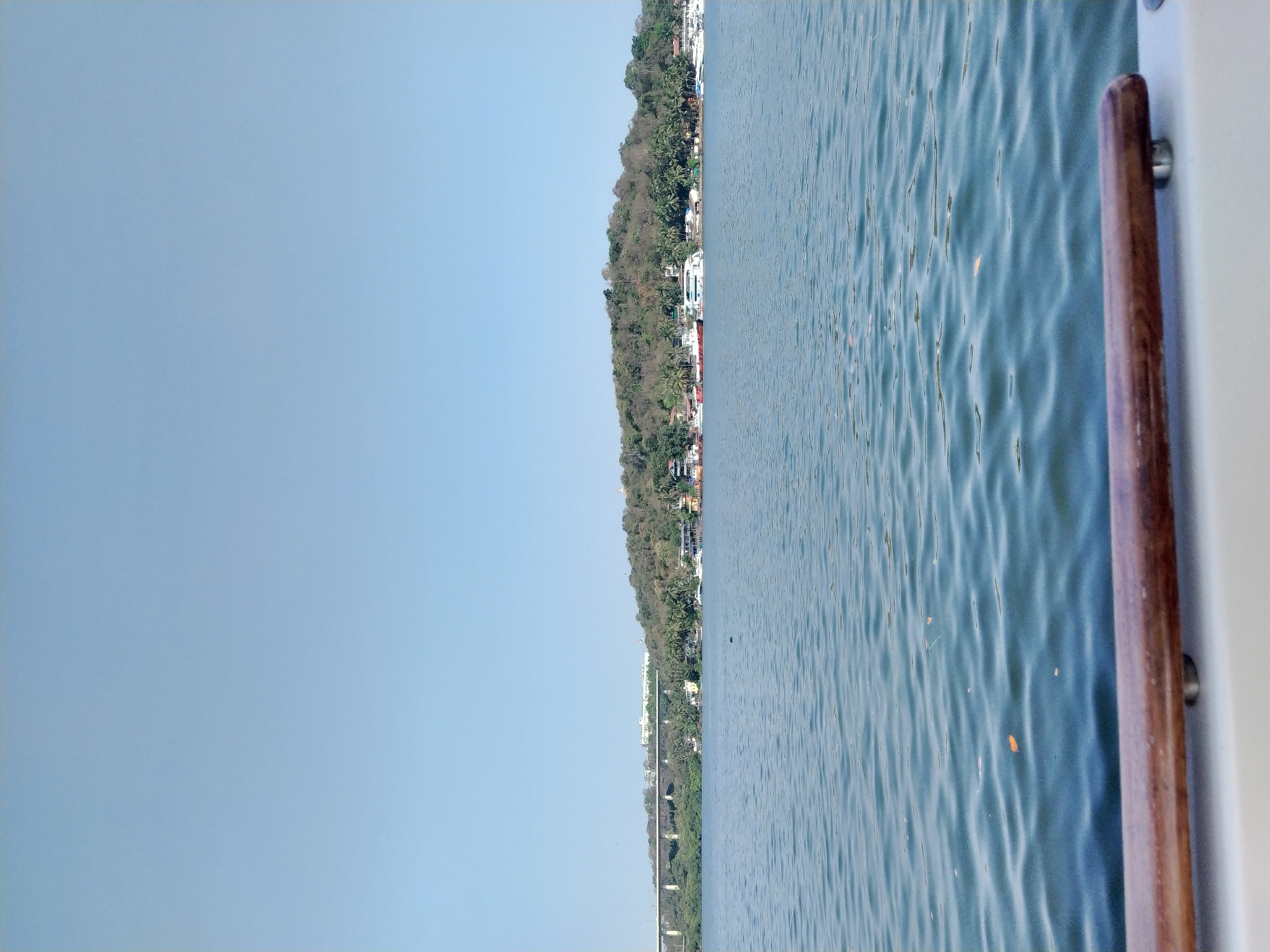 Early morning boat trip documented on Mandovi River, Panaji