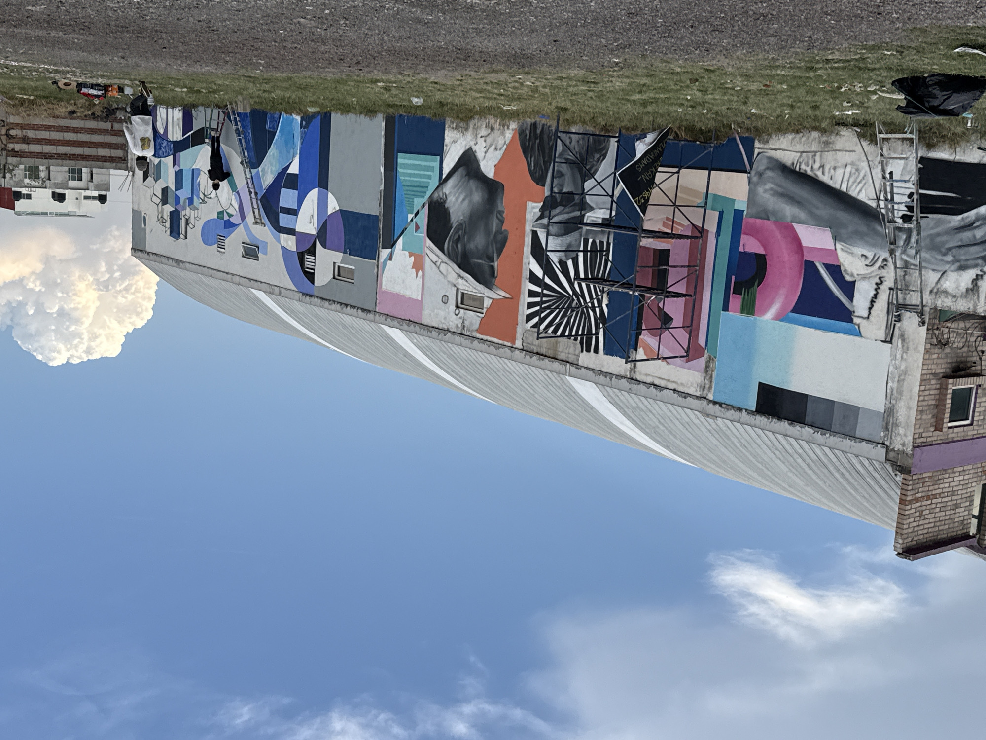 Artist works on large mural in San Andrés Cholula