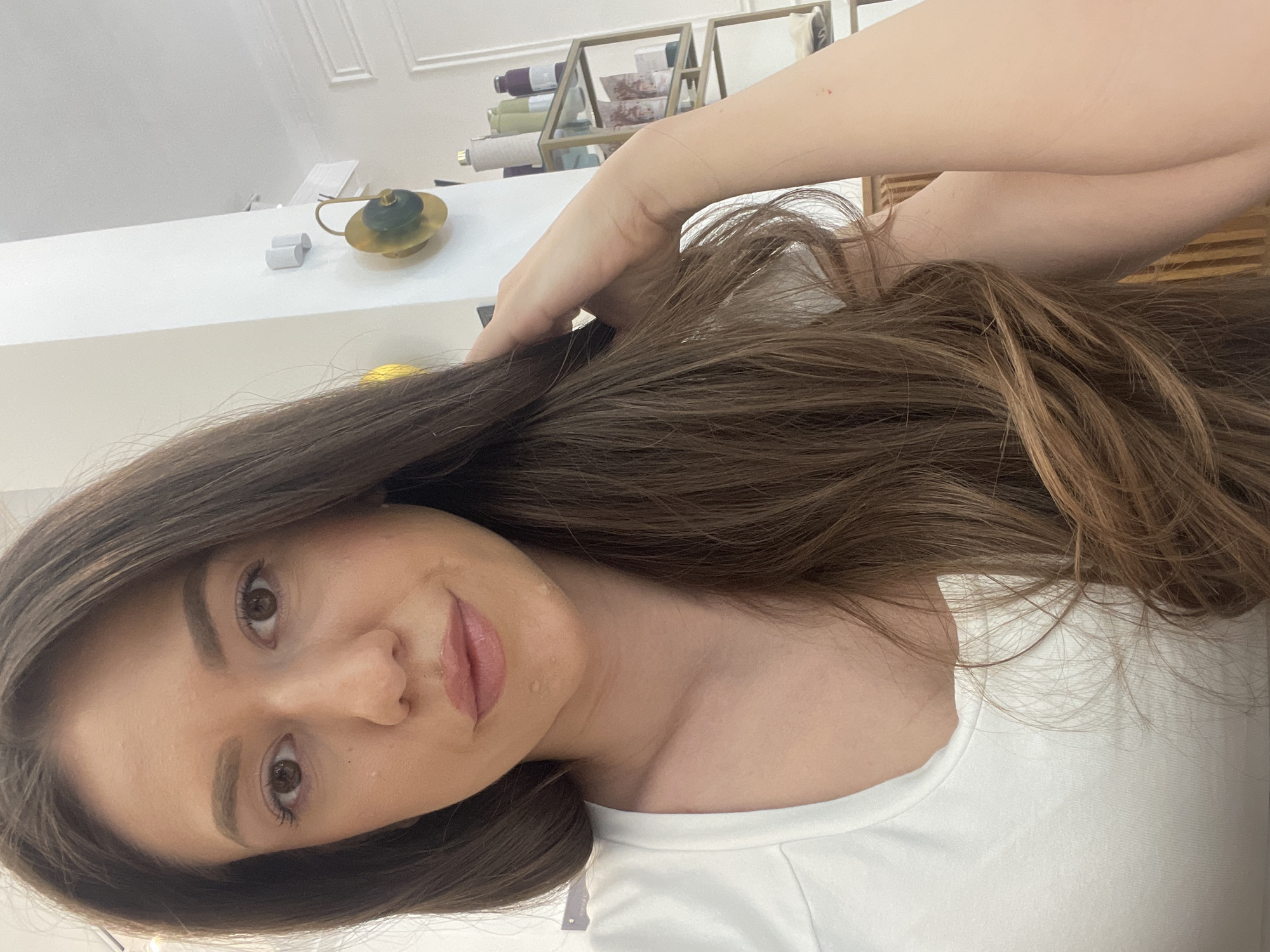 Woman takes selfies in Sofia public restroom facility