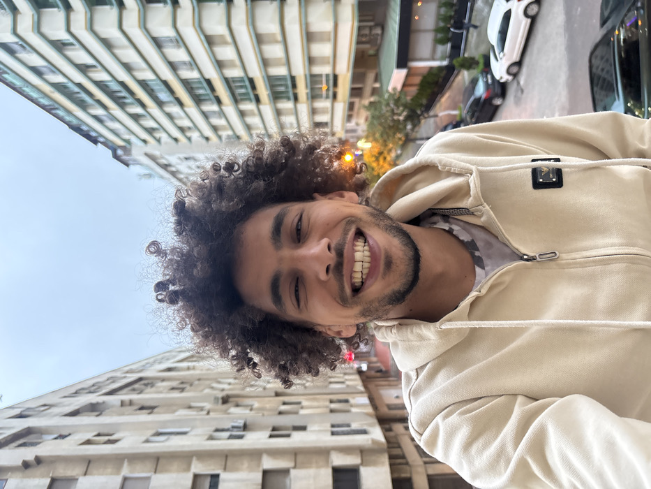 Tourist documents daily life scenes across Tangier, Morocco