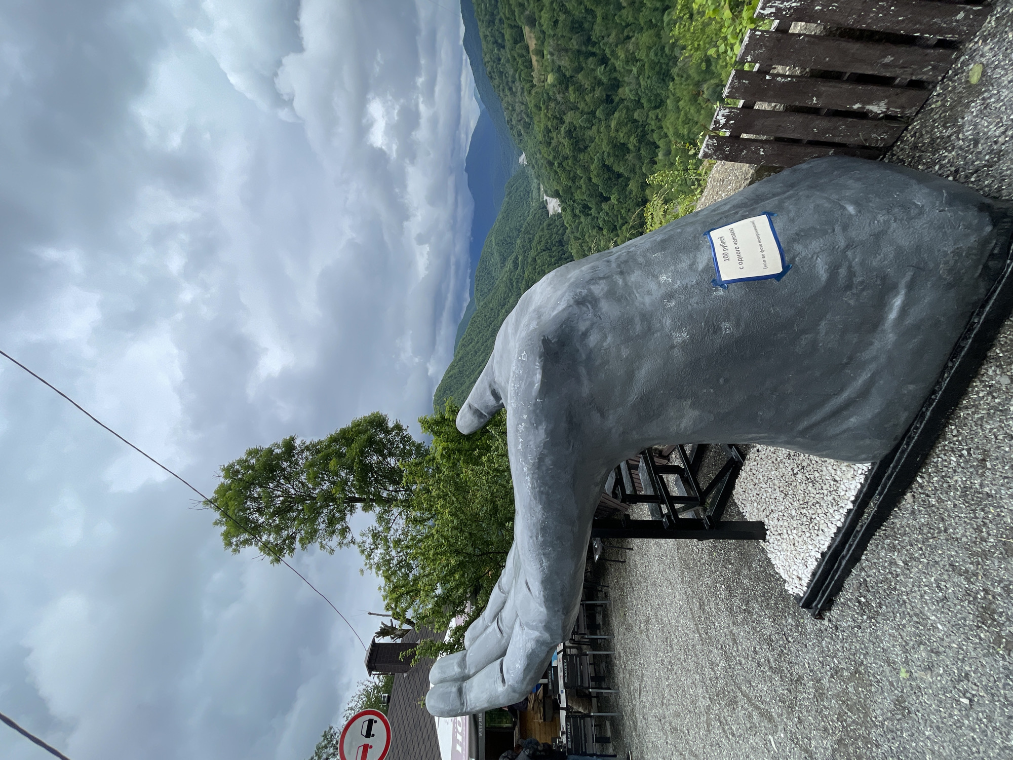 Tourist documents sculpture trail and mountain views in Khartsyz Pervyi
