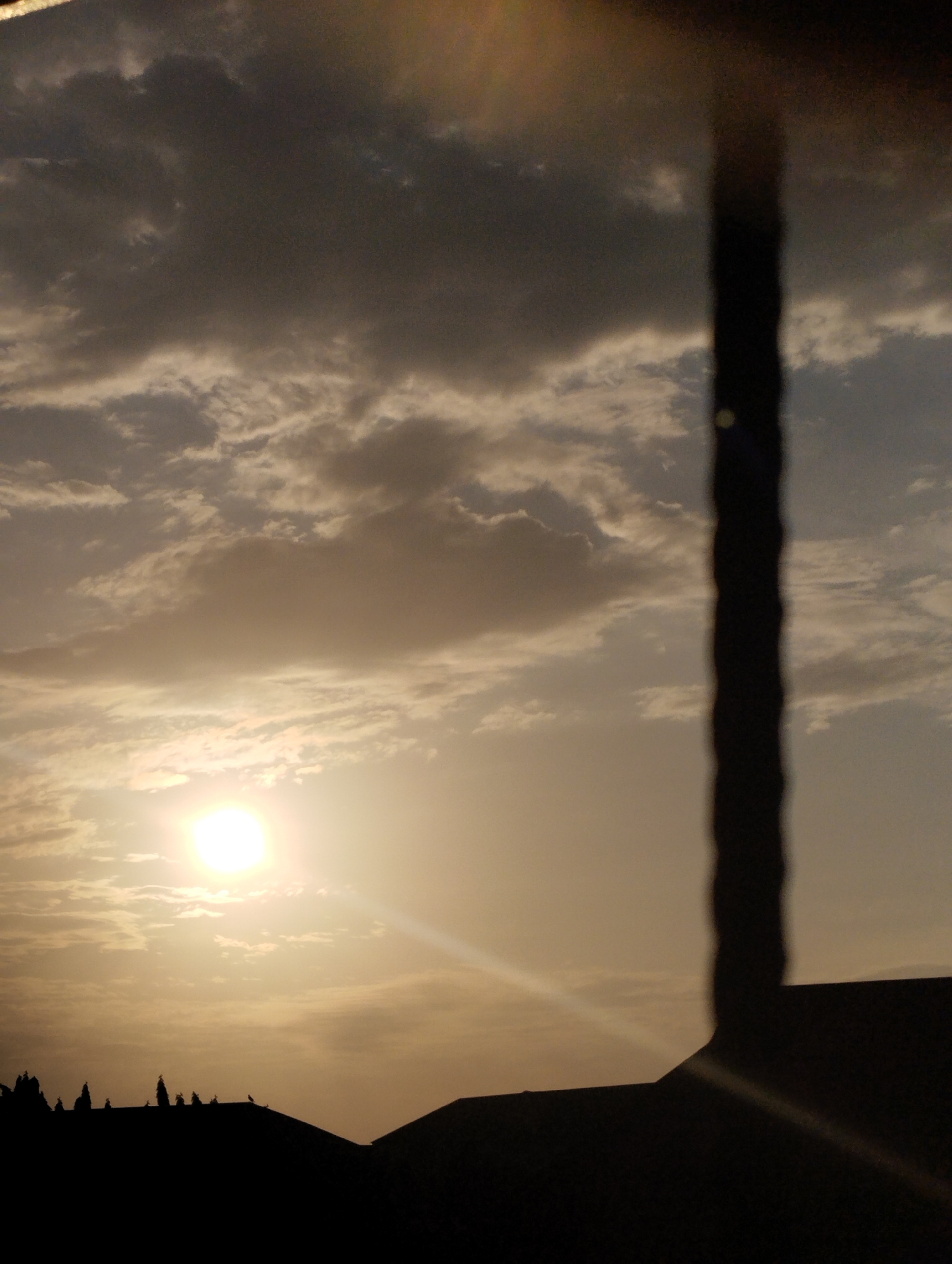 Sunset observed in Ihiagwa, Nigeria with cloudy sky formations