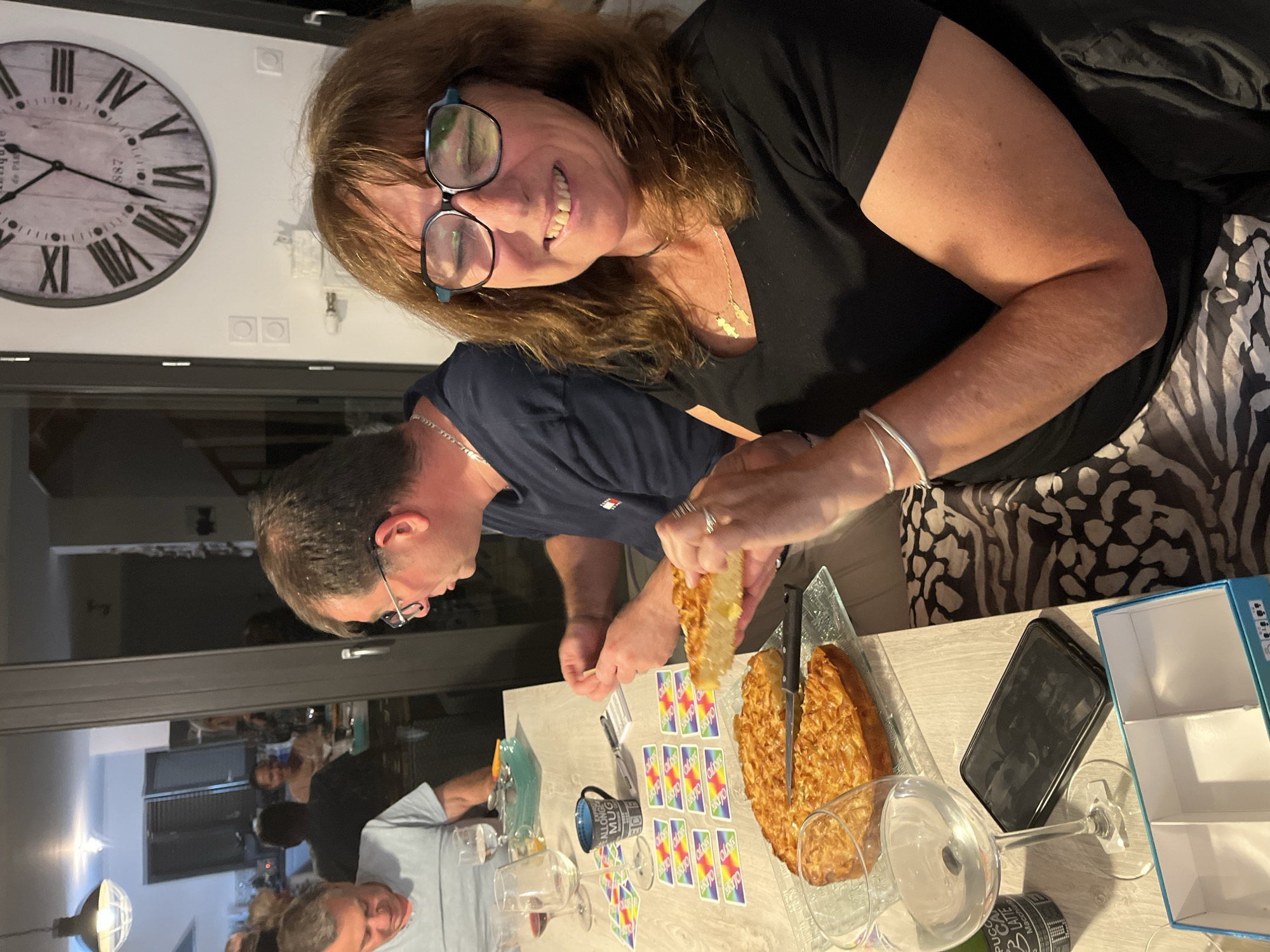 Friends gather for game night with cake in Chambœuf
