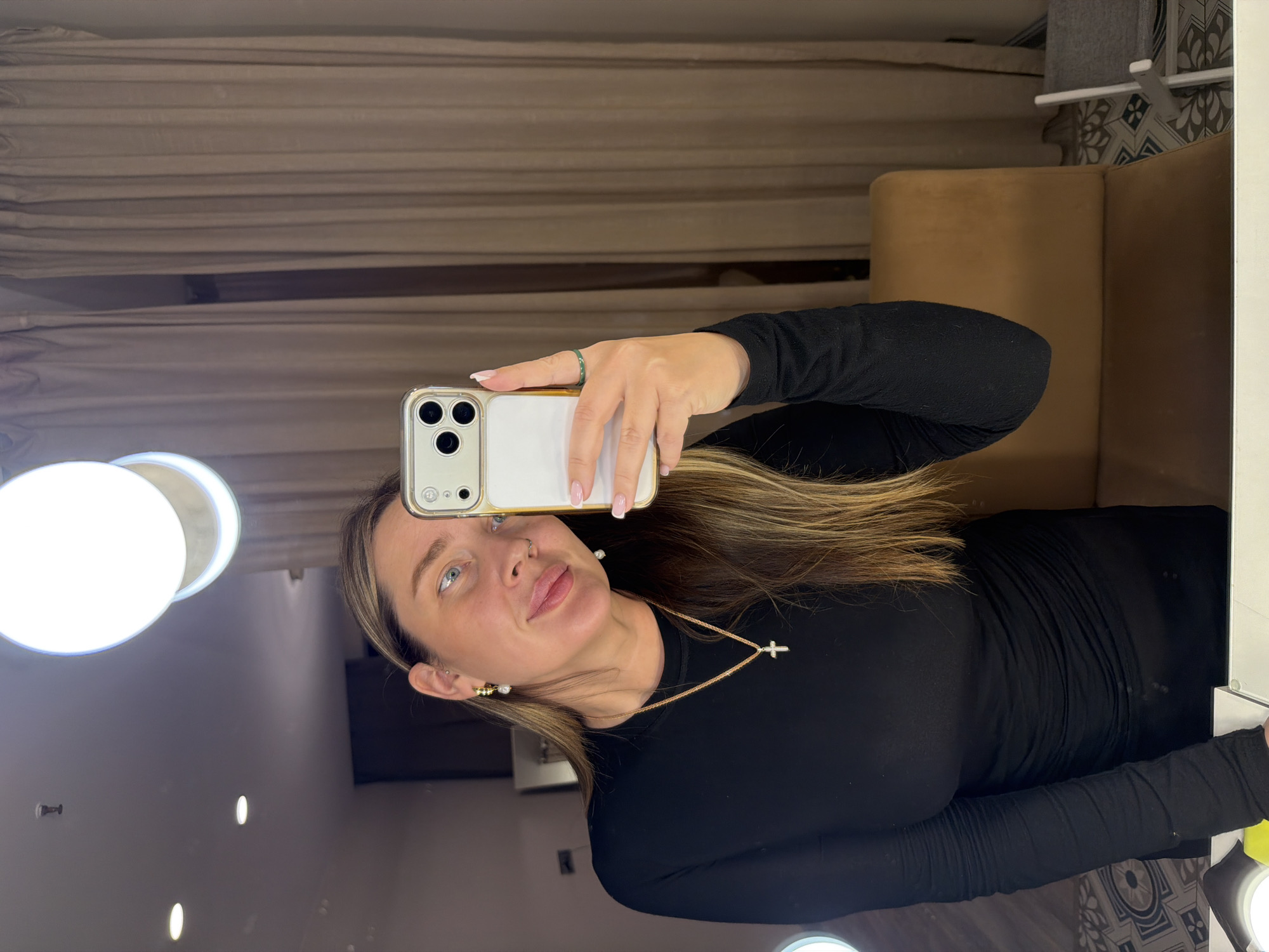 Woman Takes Mirror Selfie in Moscow