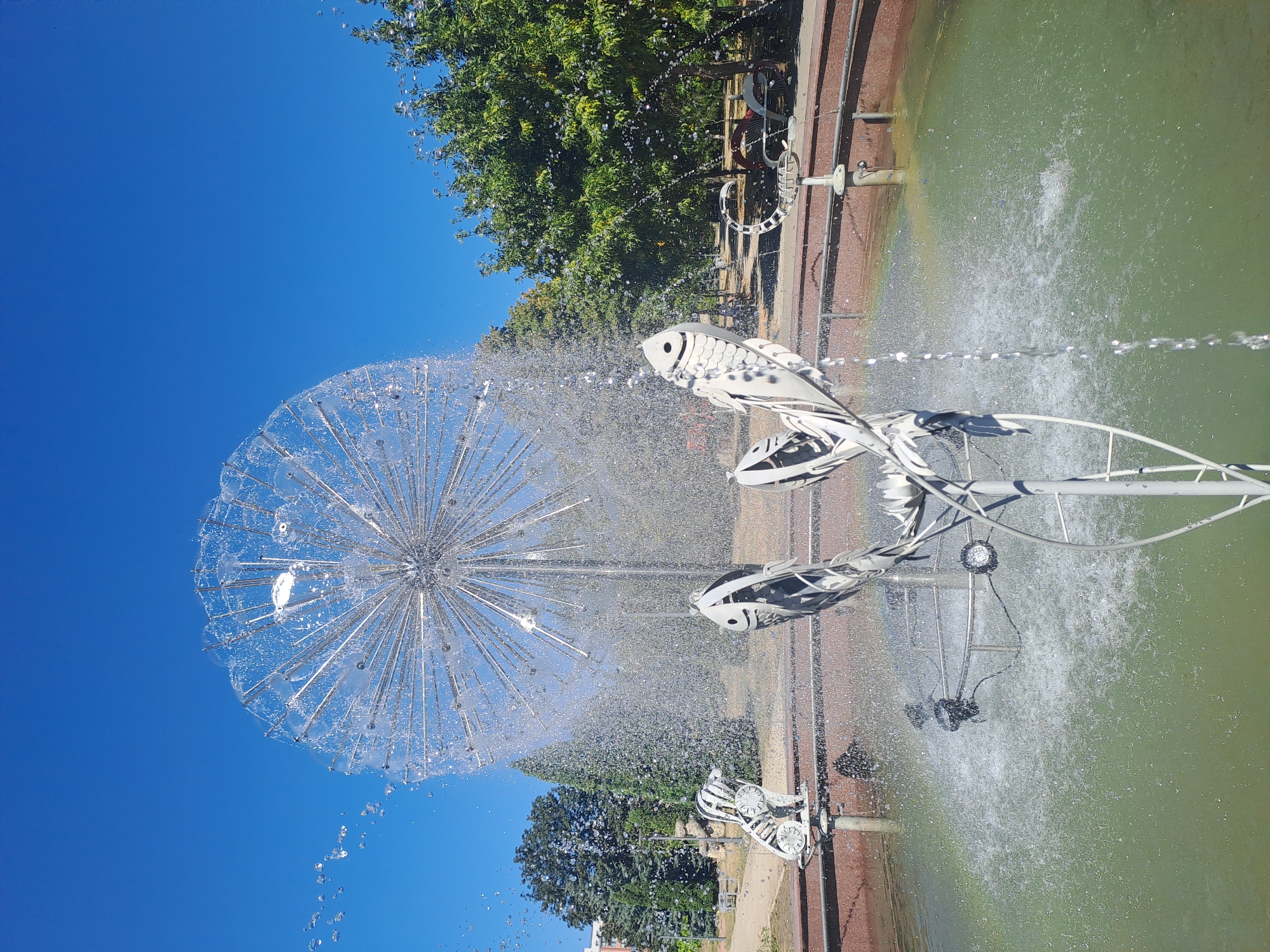 Chișinău's ornamental fountains on a bright summer morning