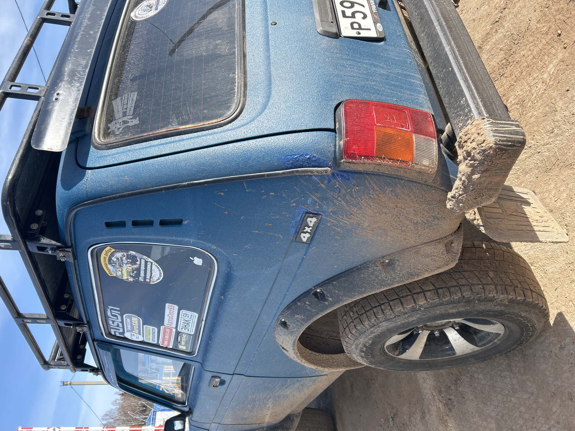 Off-road vehicle and portraits documented in rural Russia