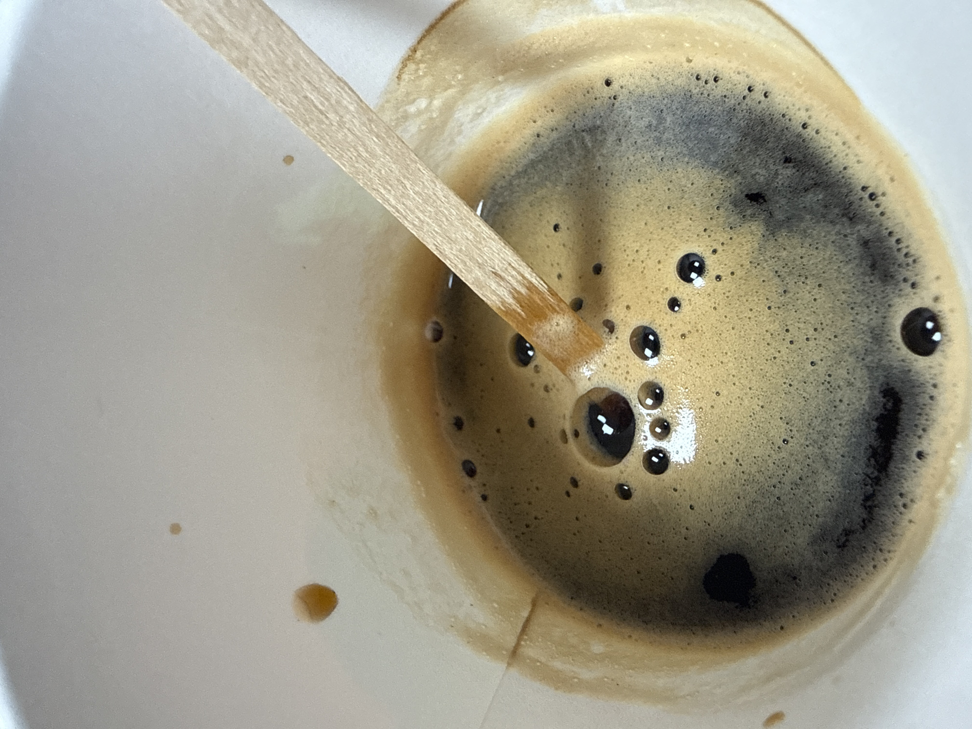 Coffee with wooden stirrer in Aksakovo, Bulgaria