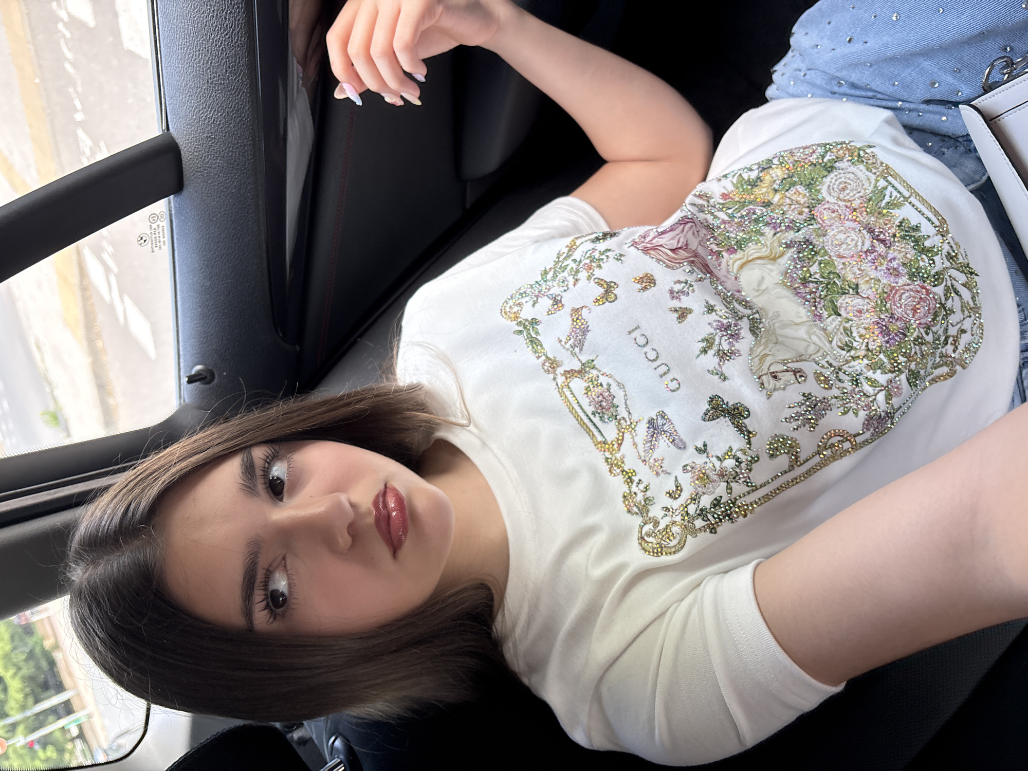Young woman photographed in vehicle during brief morning timespan