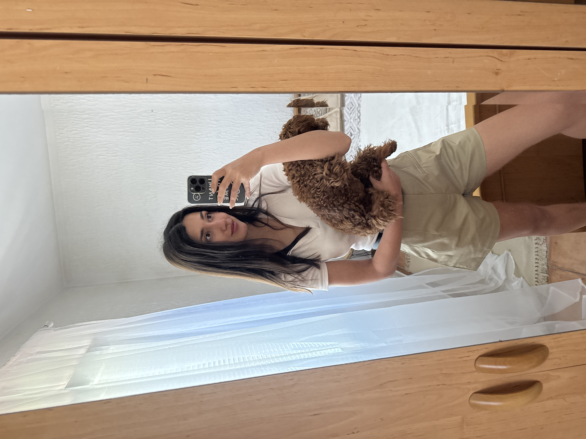 Woman takes selfies with small dog in Montenegro