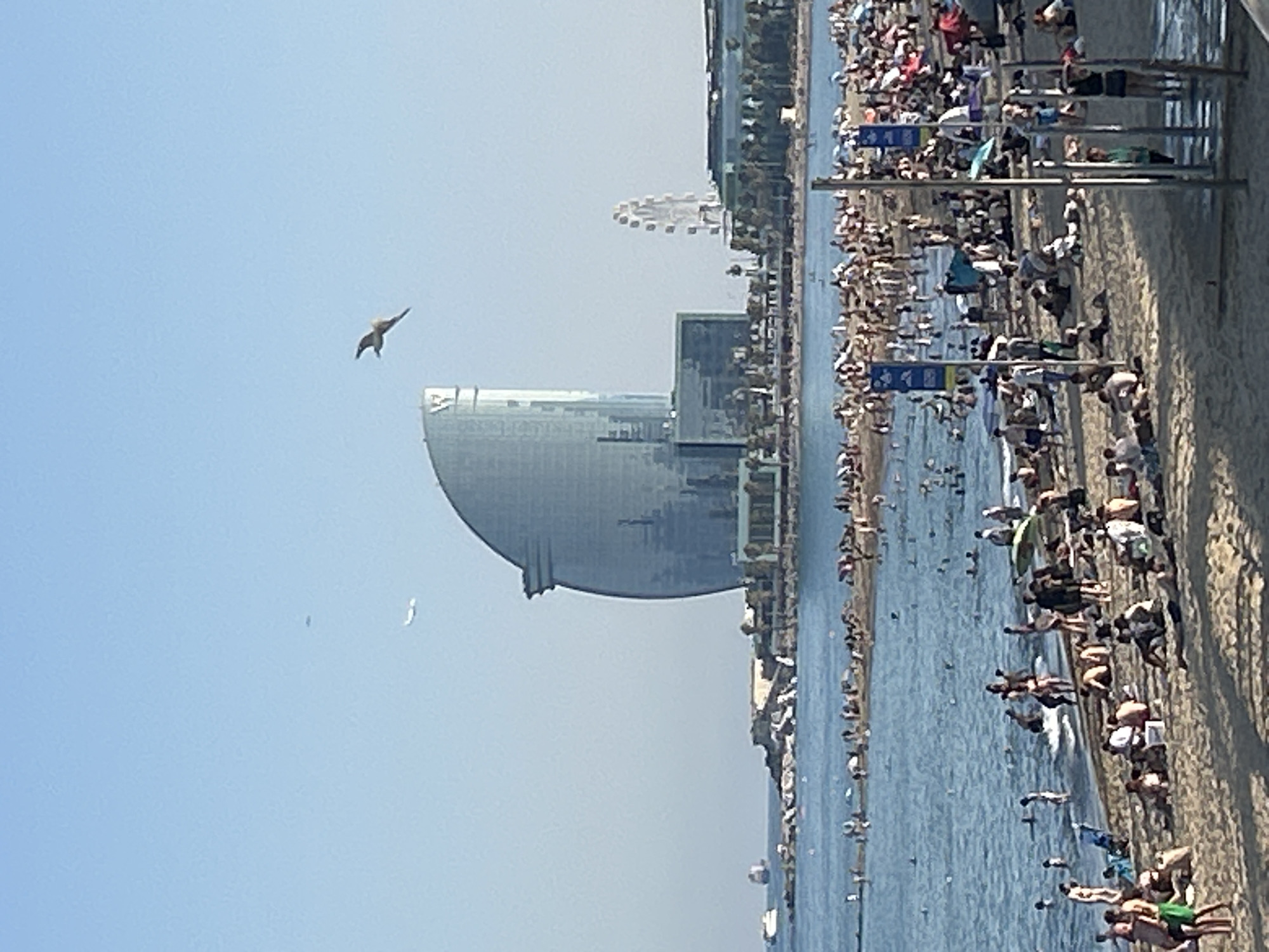 Sun, sand, and street music along Barcelona's Barceloneta beachfront