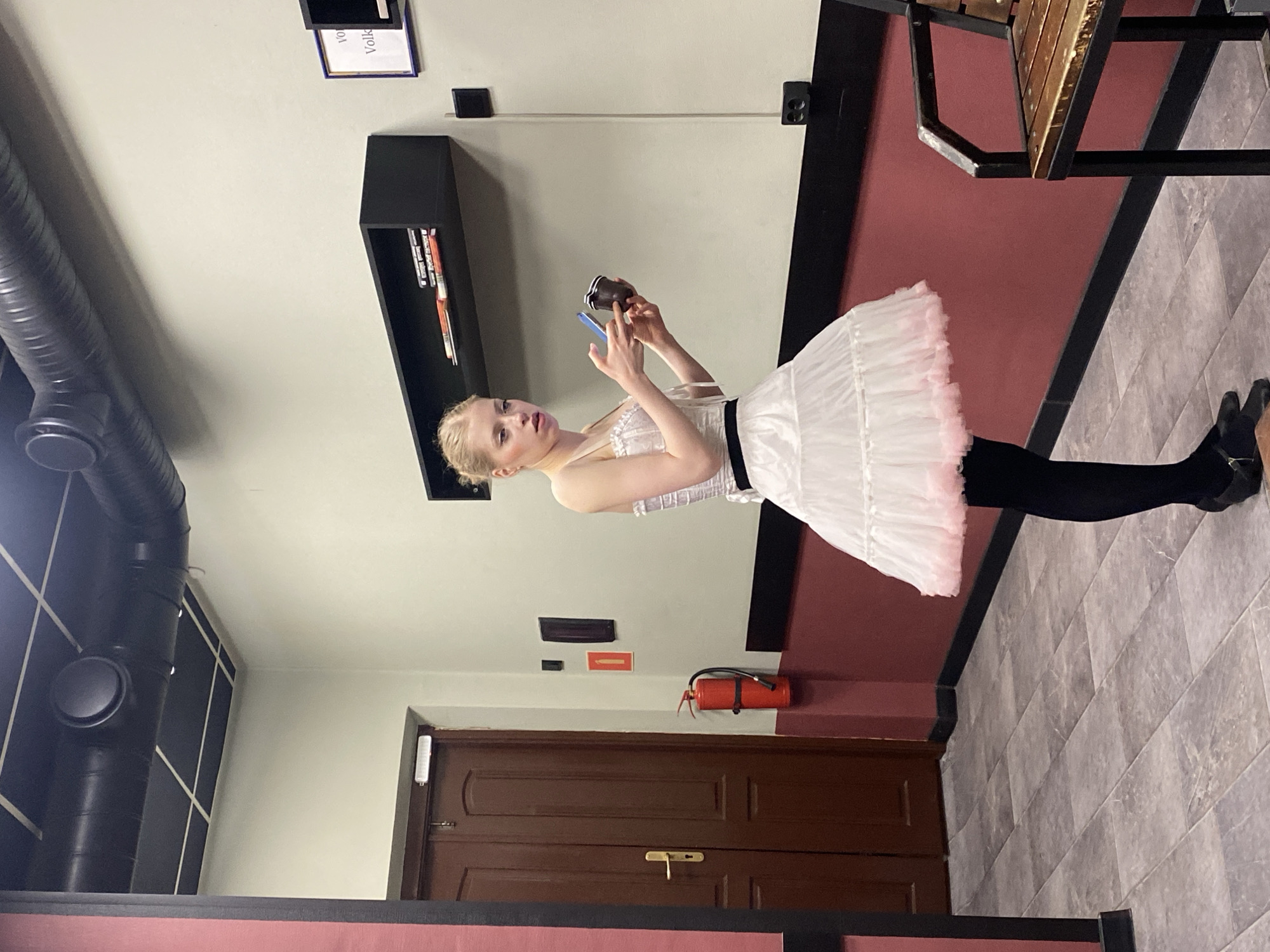 Ballerina with smartphone spotted at undisclosed location