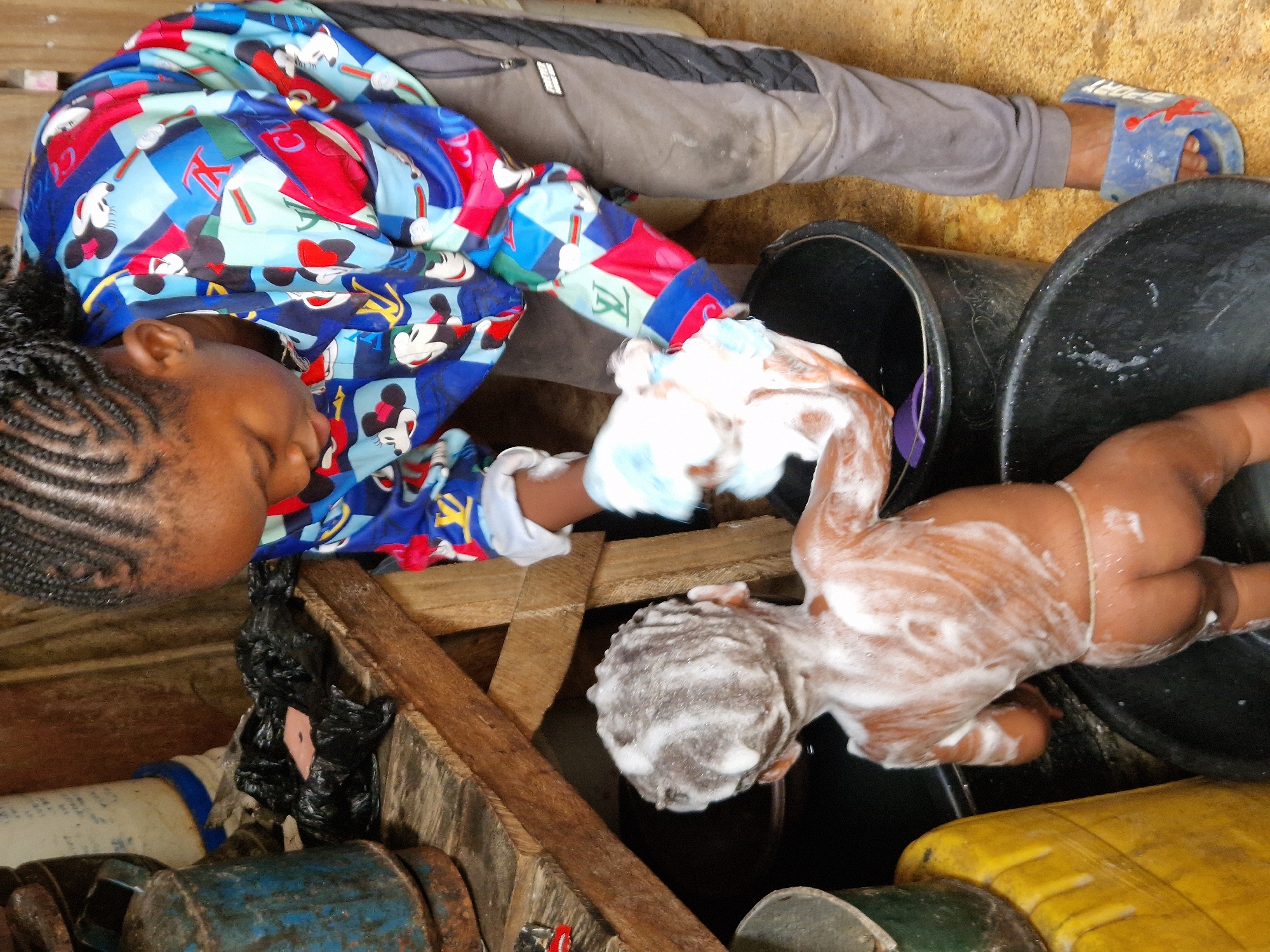 Street-level life in a West African community, one July morning