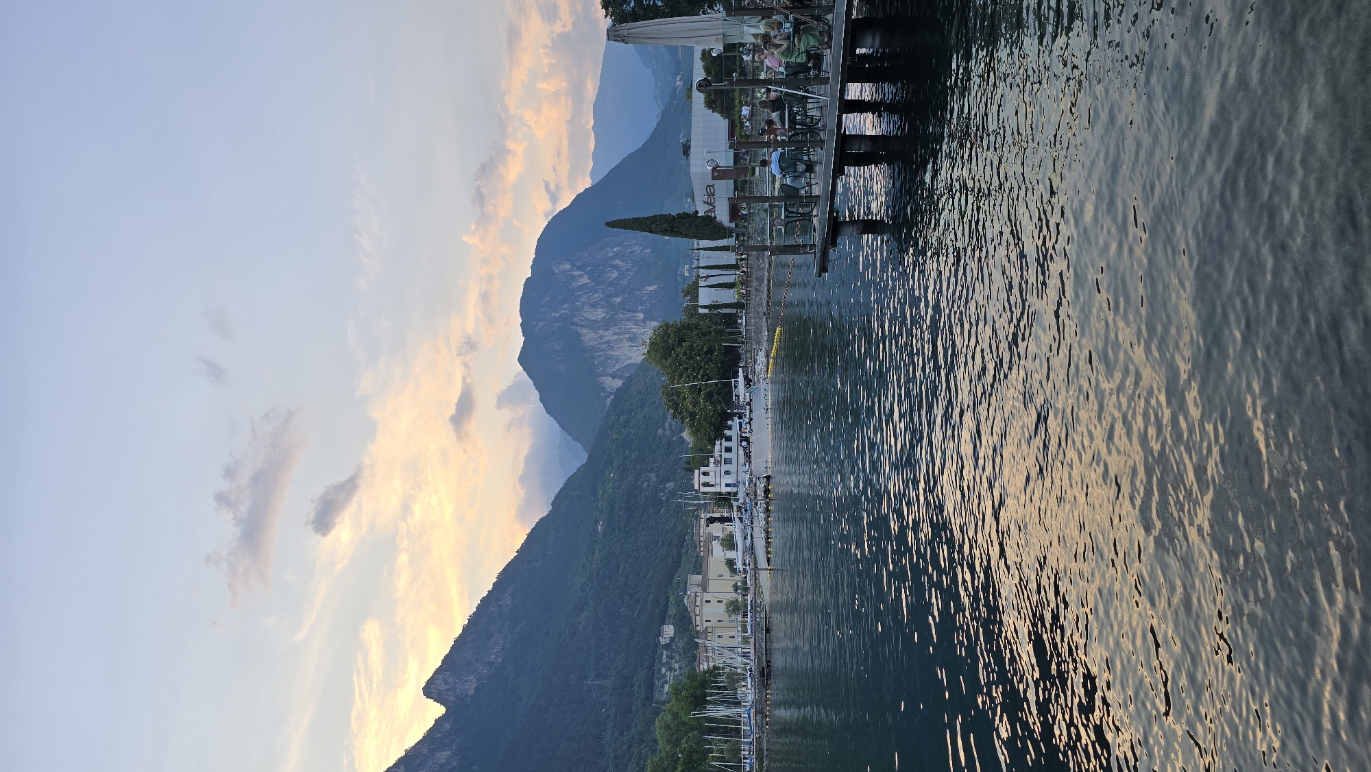 Sunset evening on the waterfront in Riva del Garda