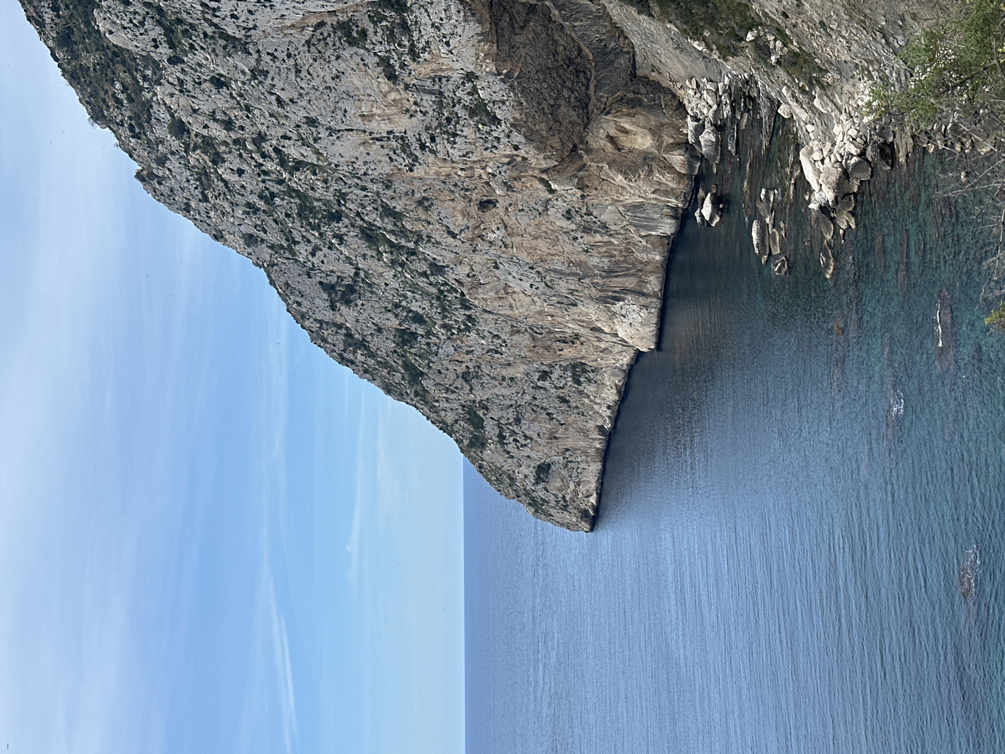 Tourists document iconic Peñón de Ifach cliff from multiple perspectives