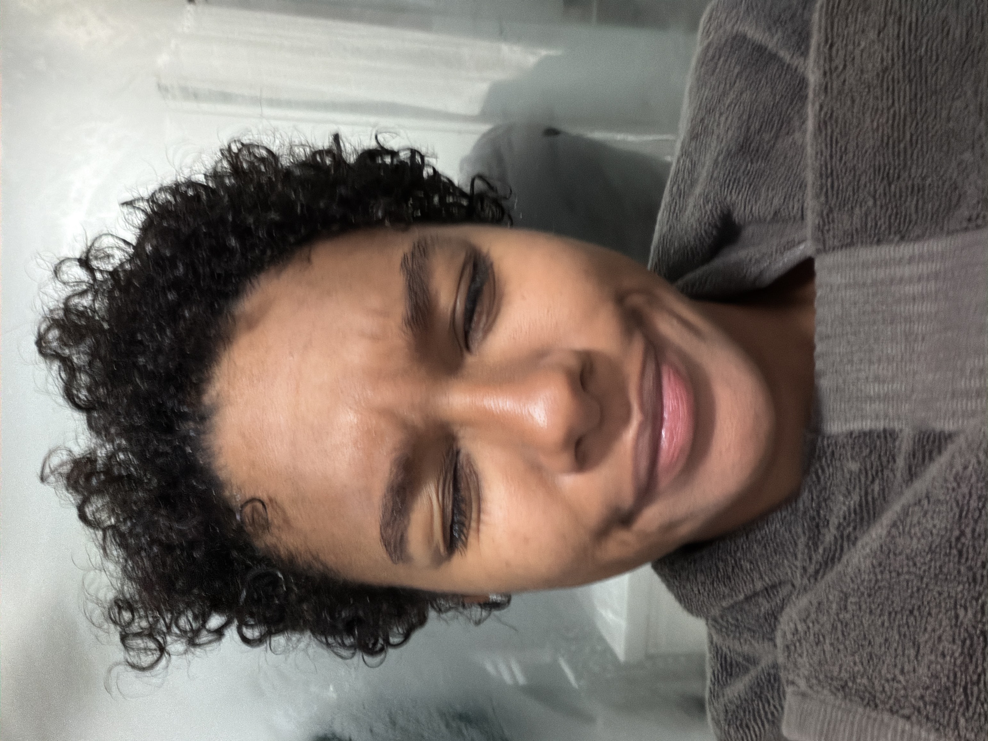 Intimate portrait captured in Champs-sur-Marne bathroom setting