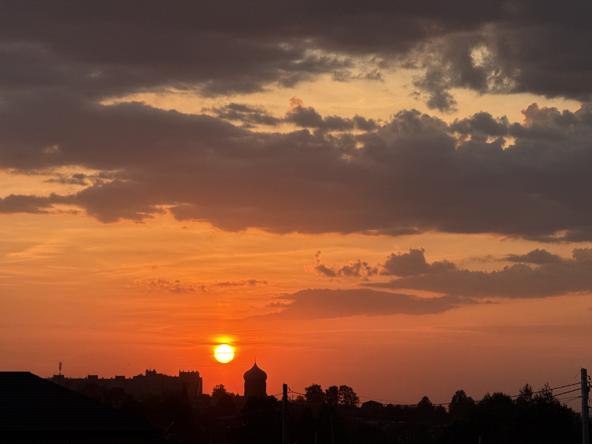 Woman documents sunset evening routine in Лобаново, Russia