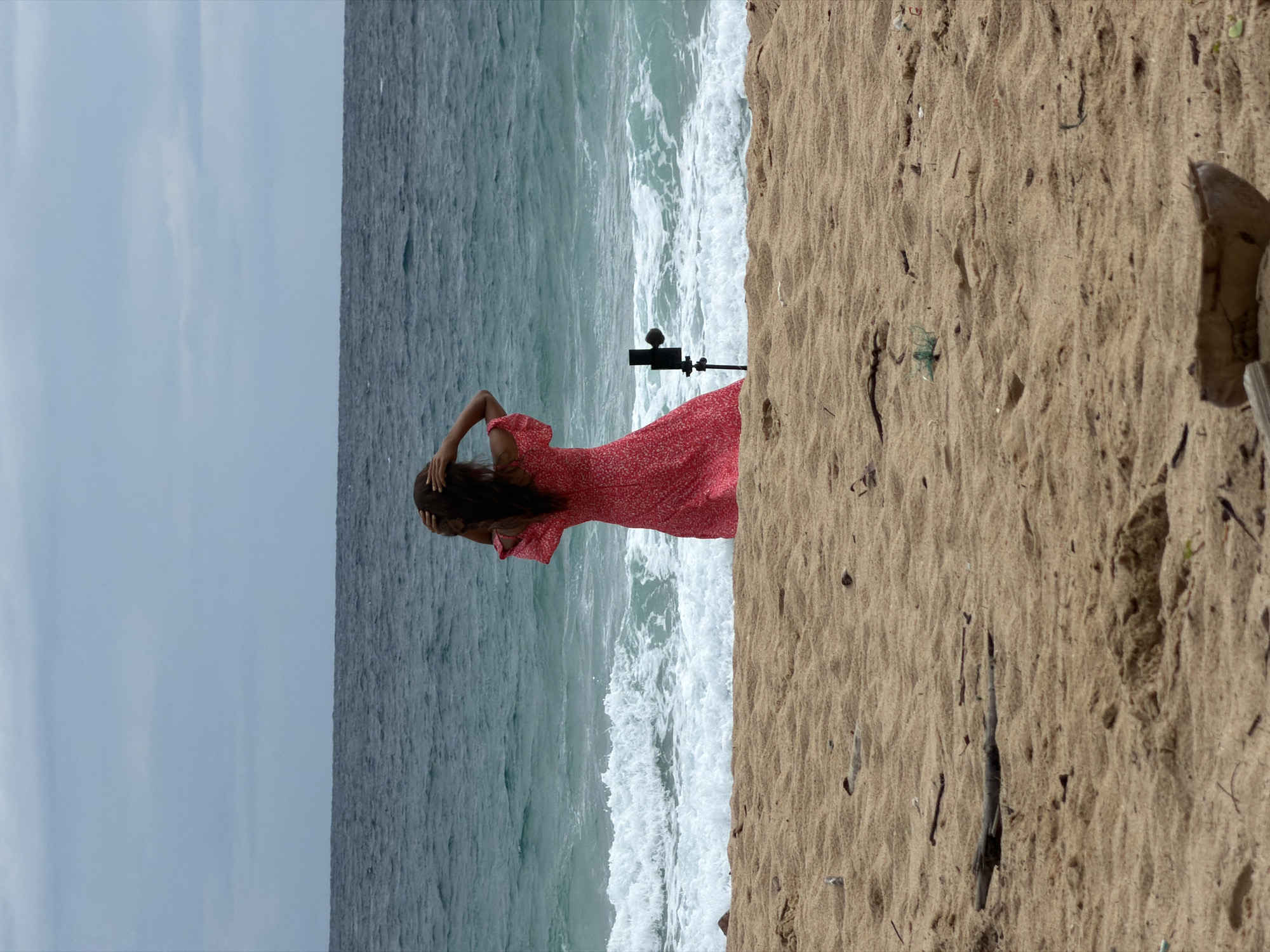 Solo tripod shoot on a Phuket beach in a red dress