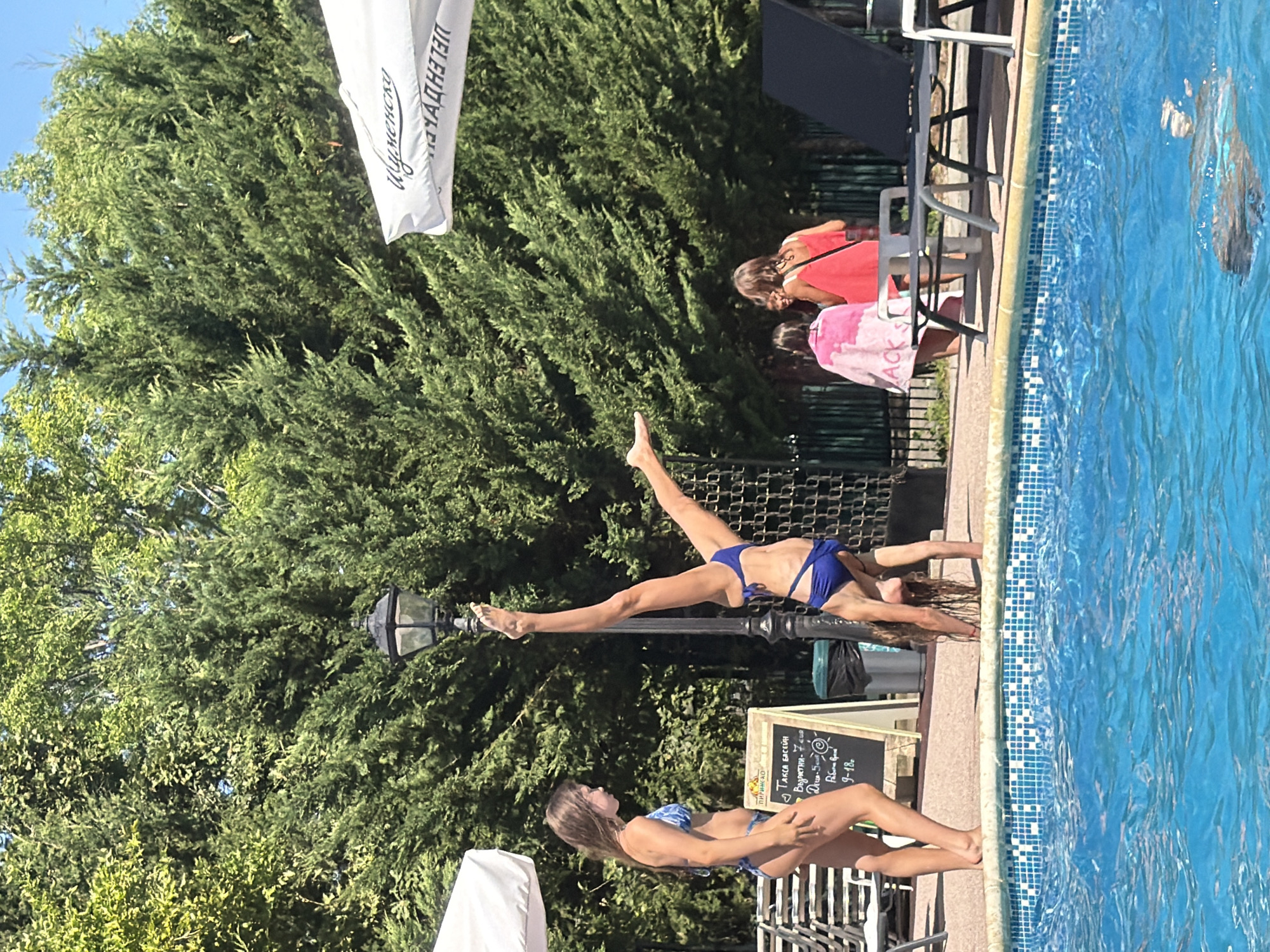 Busy summer day at a Burgas outdoor pool complex
