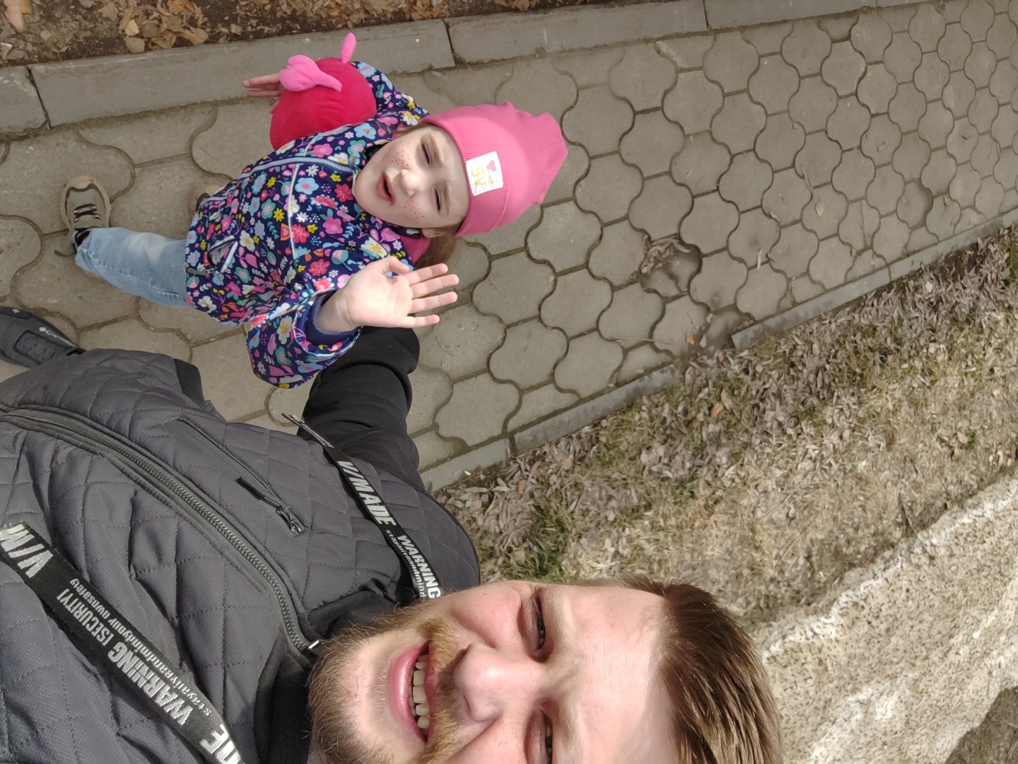 Father and daughter enjoy early morning park visit