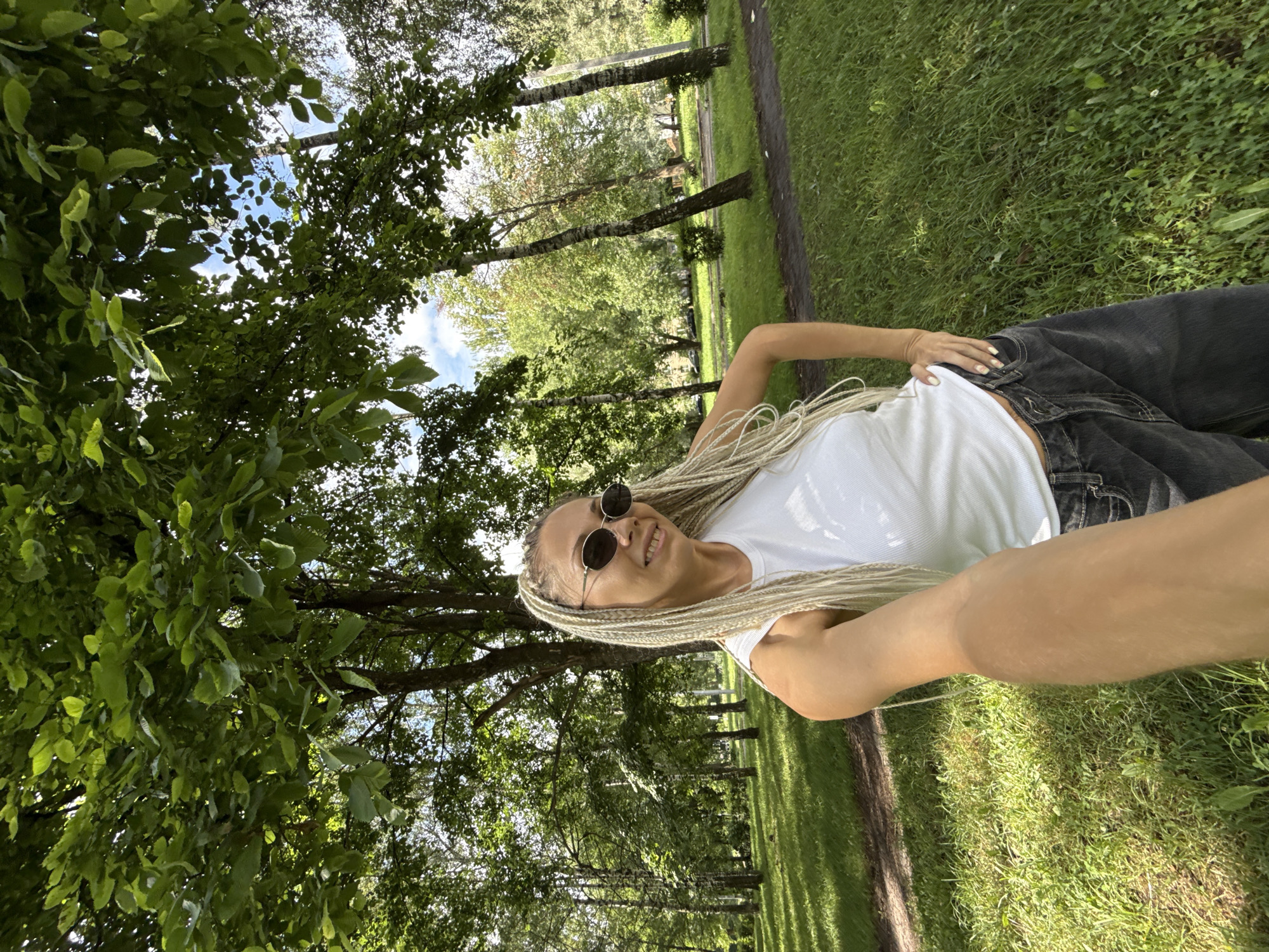 Lazy summer morning in a Rusanovo park with a child
