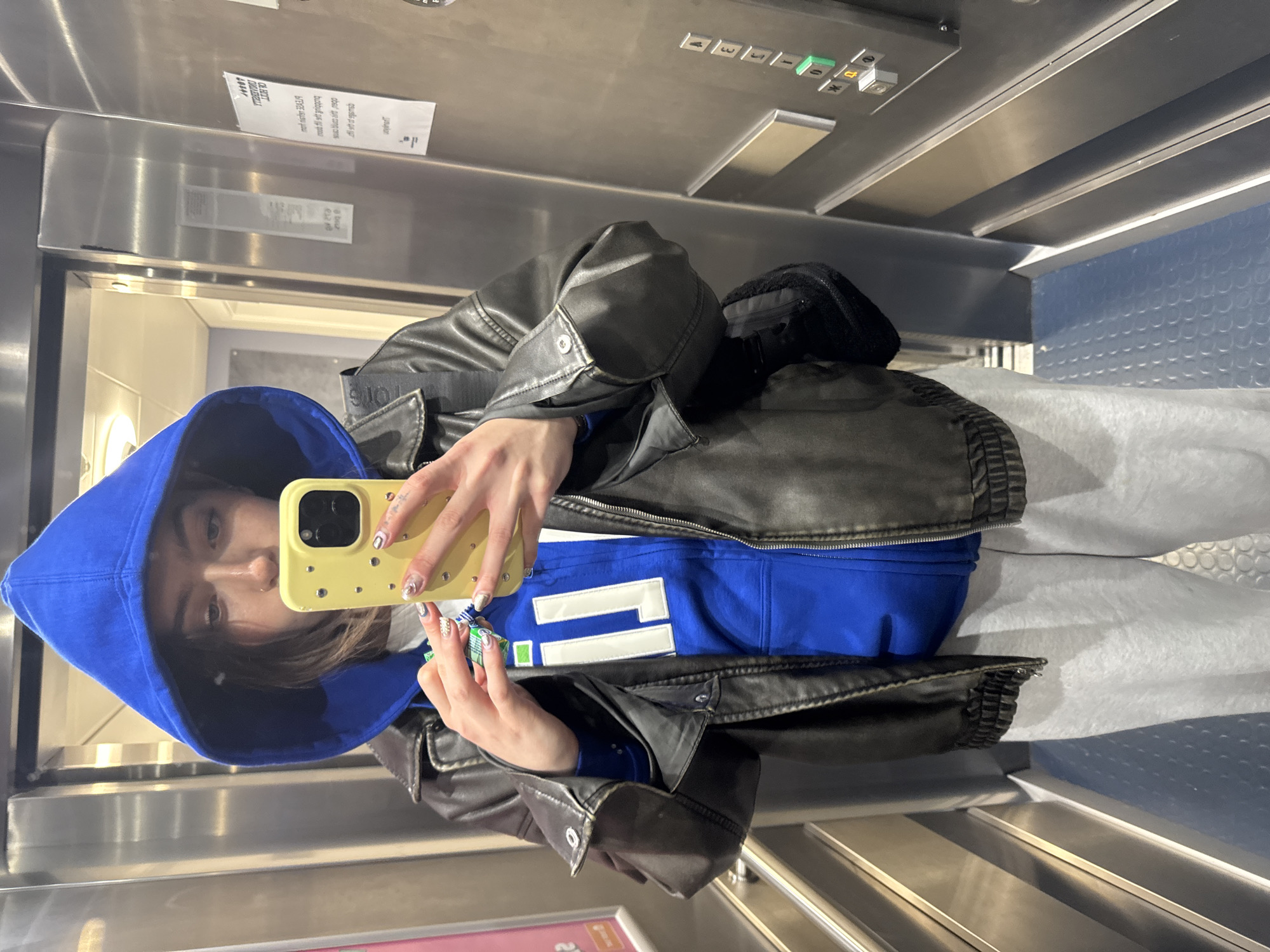 Person takes elevator selfie in Hull