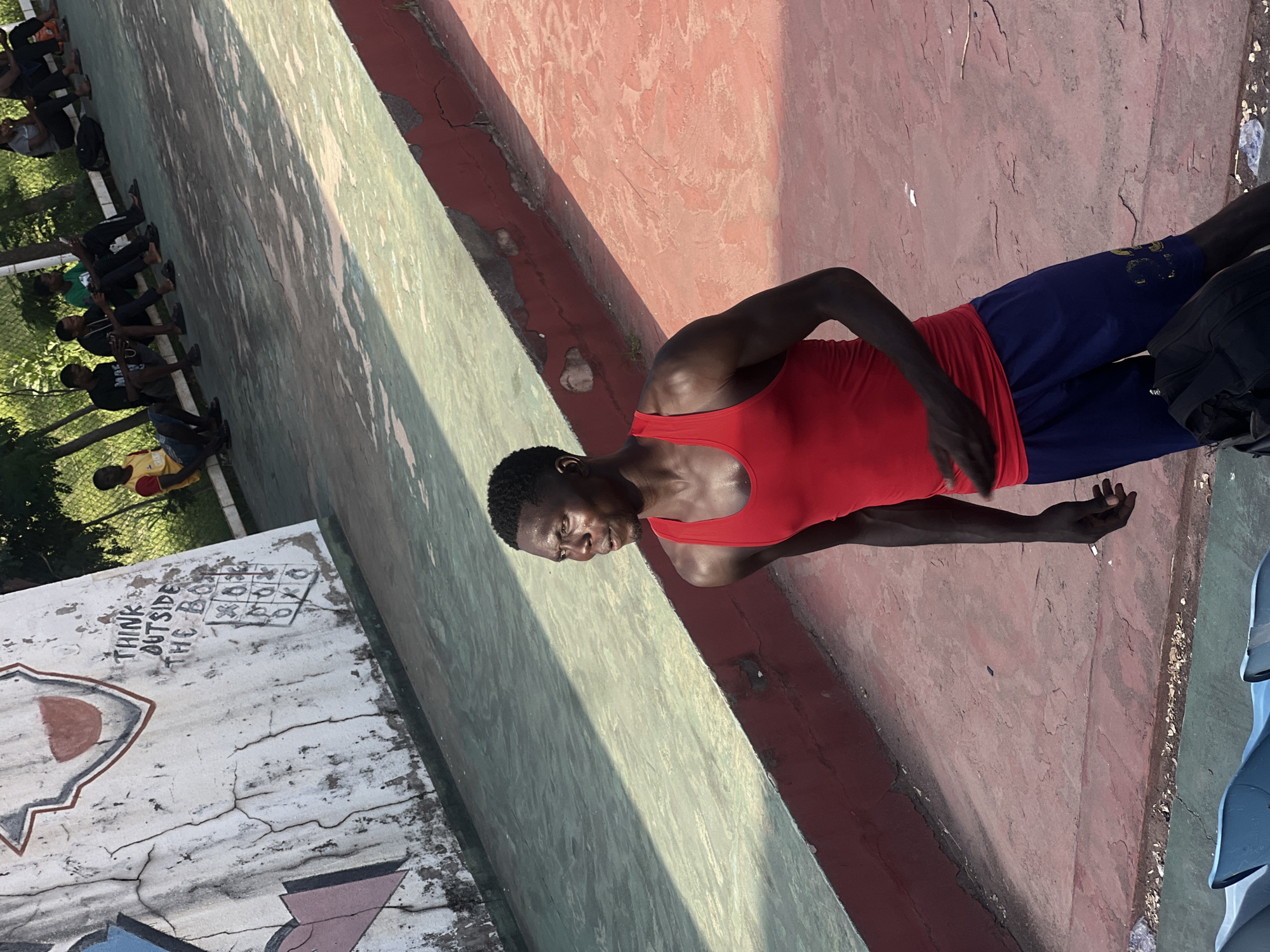Pickup basketball and downtime at an outdoor court in Jalingo