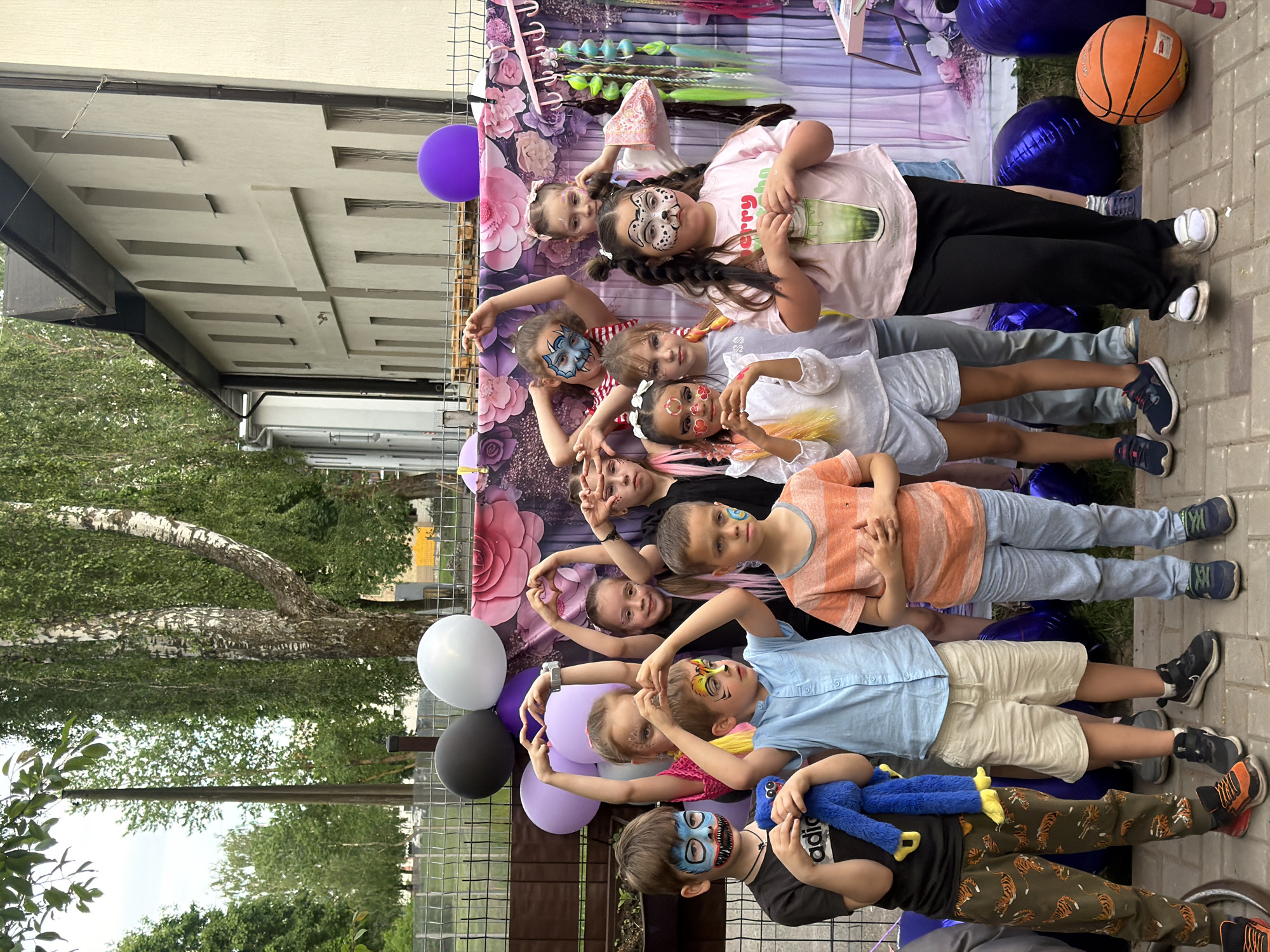 Children's outdoor party gathering documented in Riga, Latvia