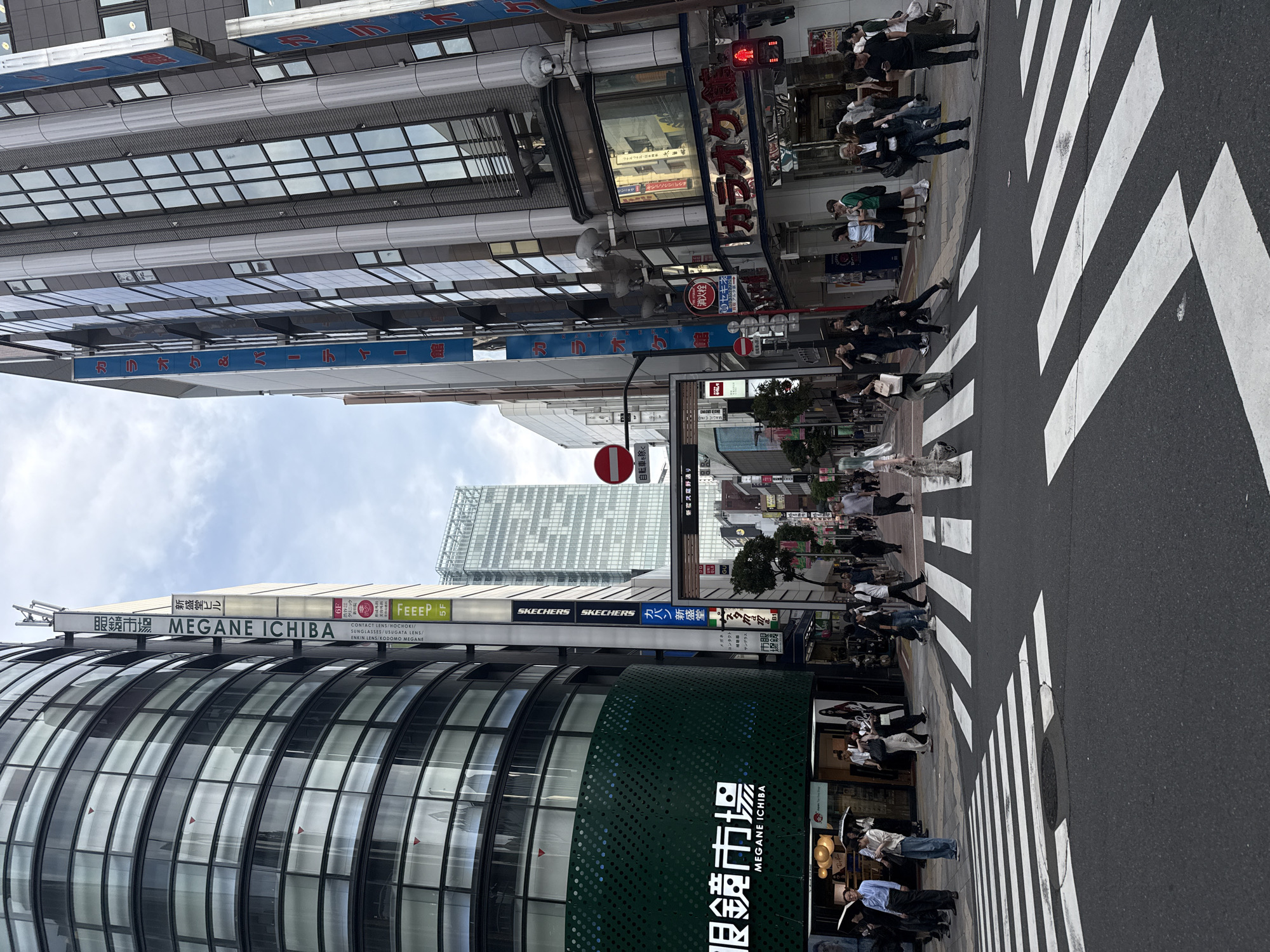 Street-level tour through Shinjuku's busy commercial district