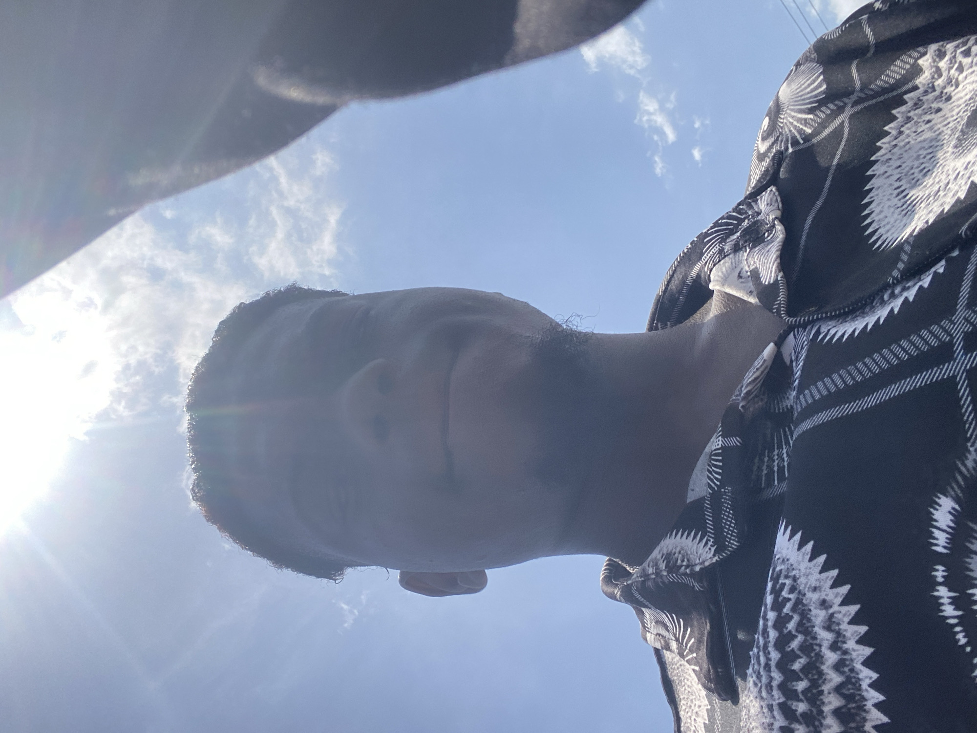 Young man documents motorcycle ride through selfies and videos