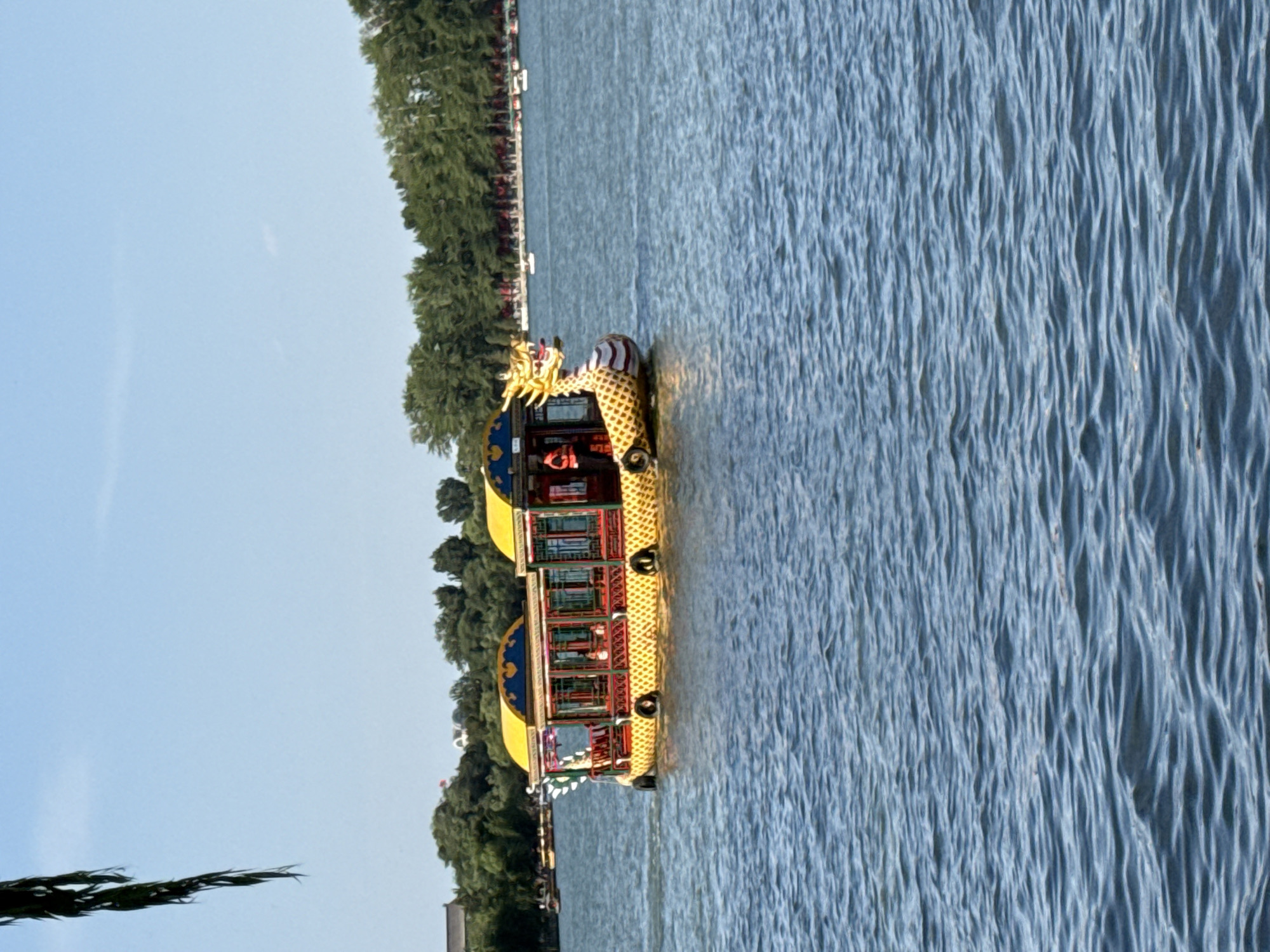 Dragon boats spotted on Beijing lake during morning hours