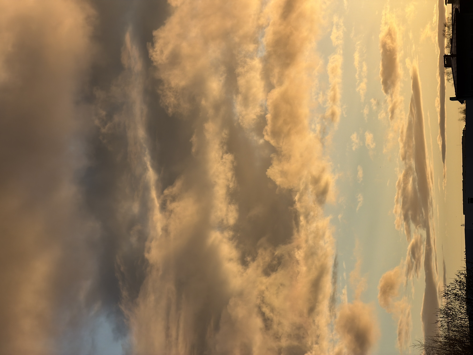 Sunset captured through clouds in Dreiliņi, Latvia