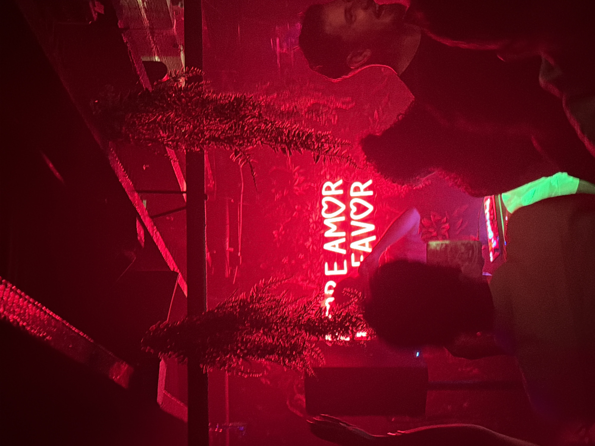 Red-lit bar interior captured in early morning Provincetown