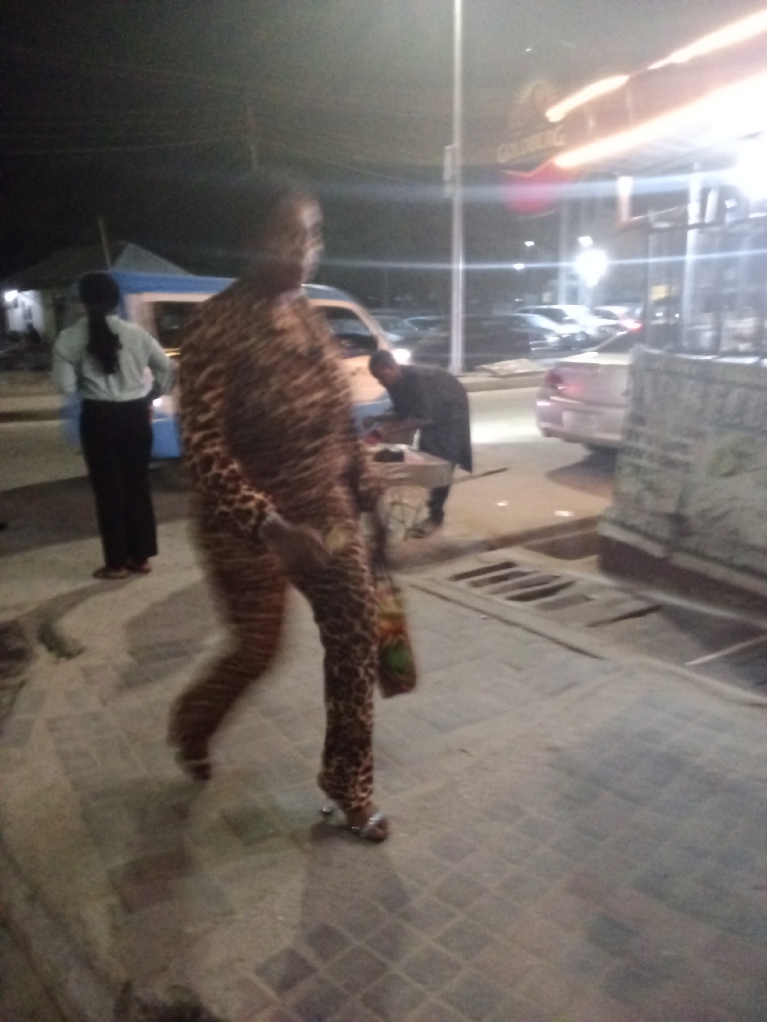 Nighttime street activity captured in Nigerian towns