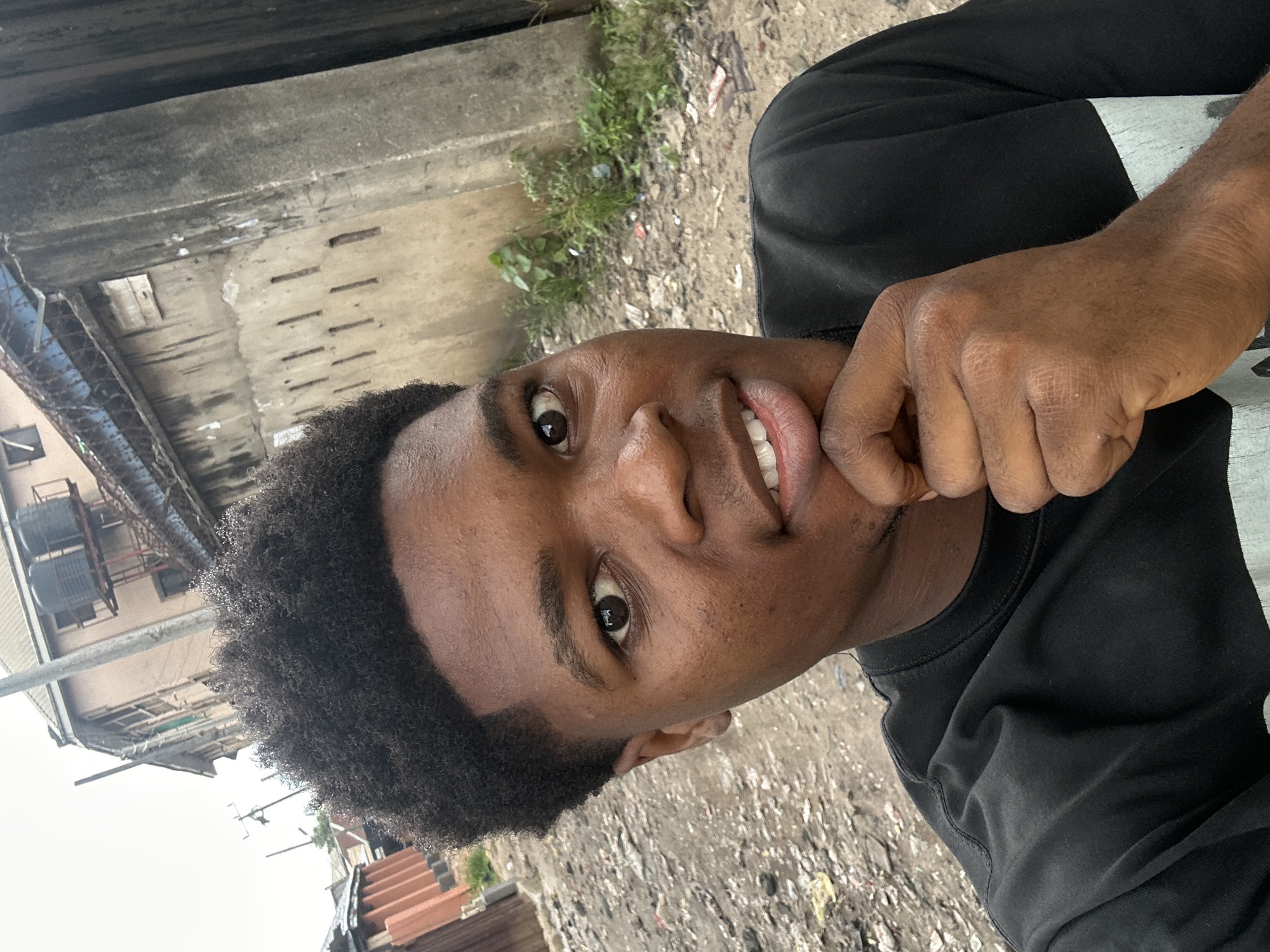 Morning scenes along Ihiagwa's dirt roads and waste-filled streets