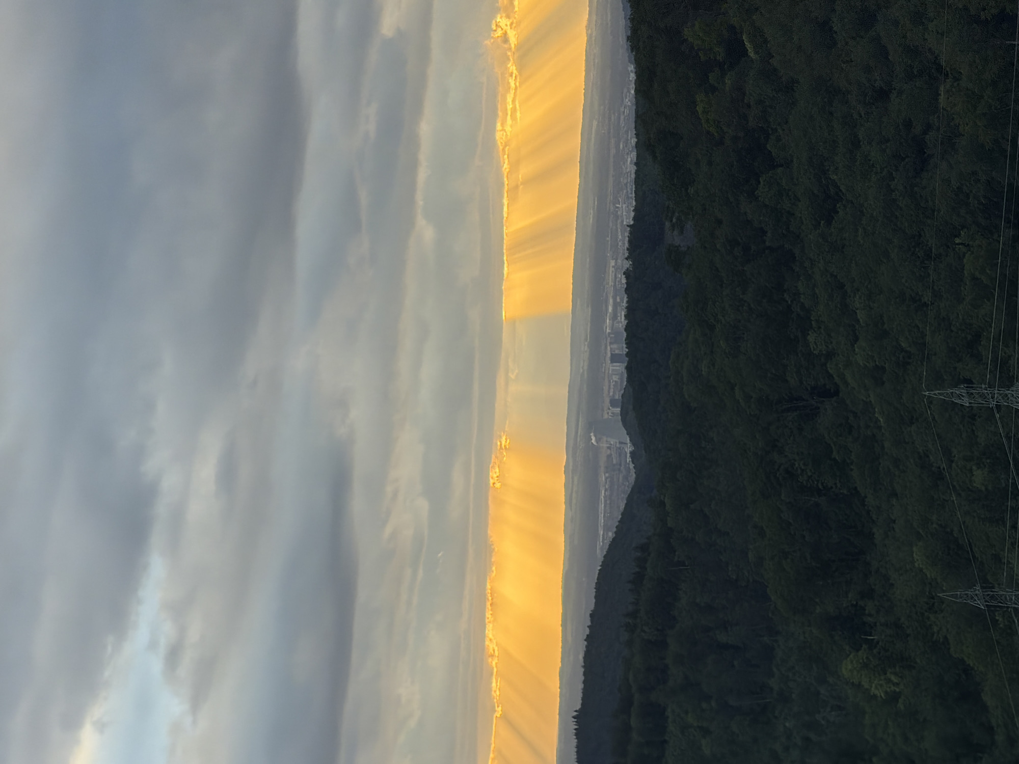 Dramatic sunset illuminates Swiss landscape over Sissach valley