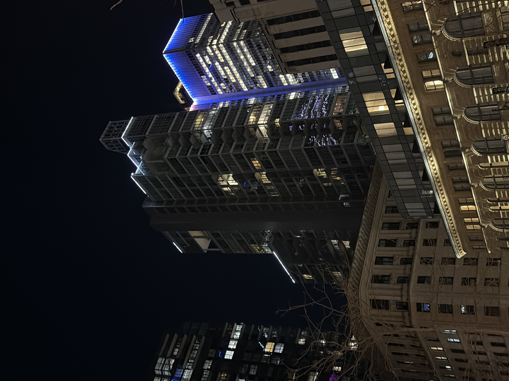 Nighttime Montreal walking tour captures illuminated landmarks and retail stops