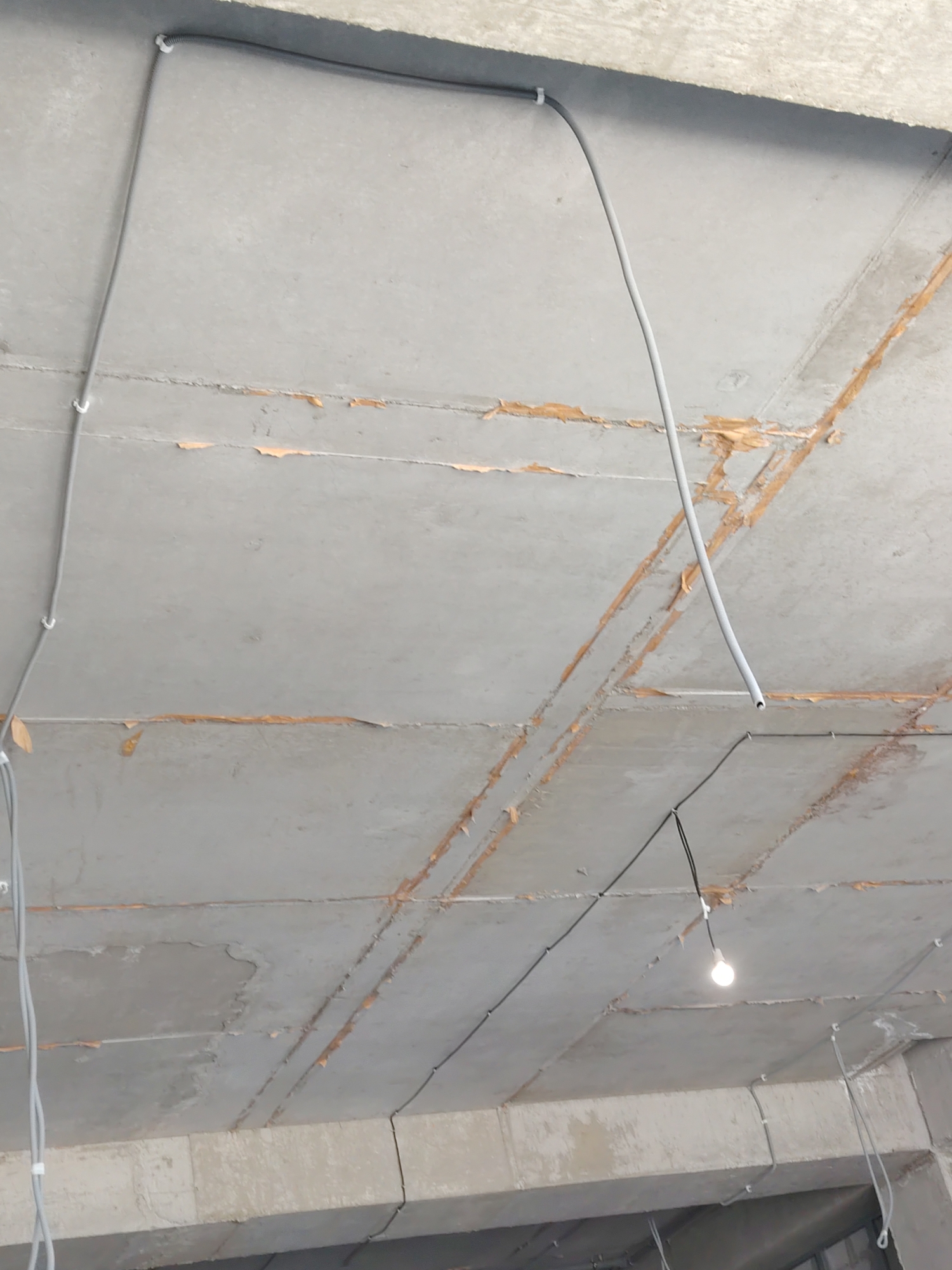Armenian text displays and concrete ceiling documented in brief sequence