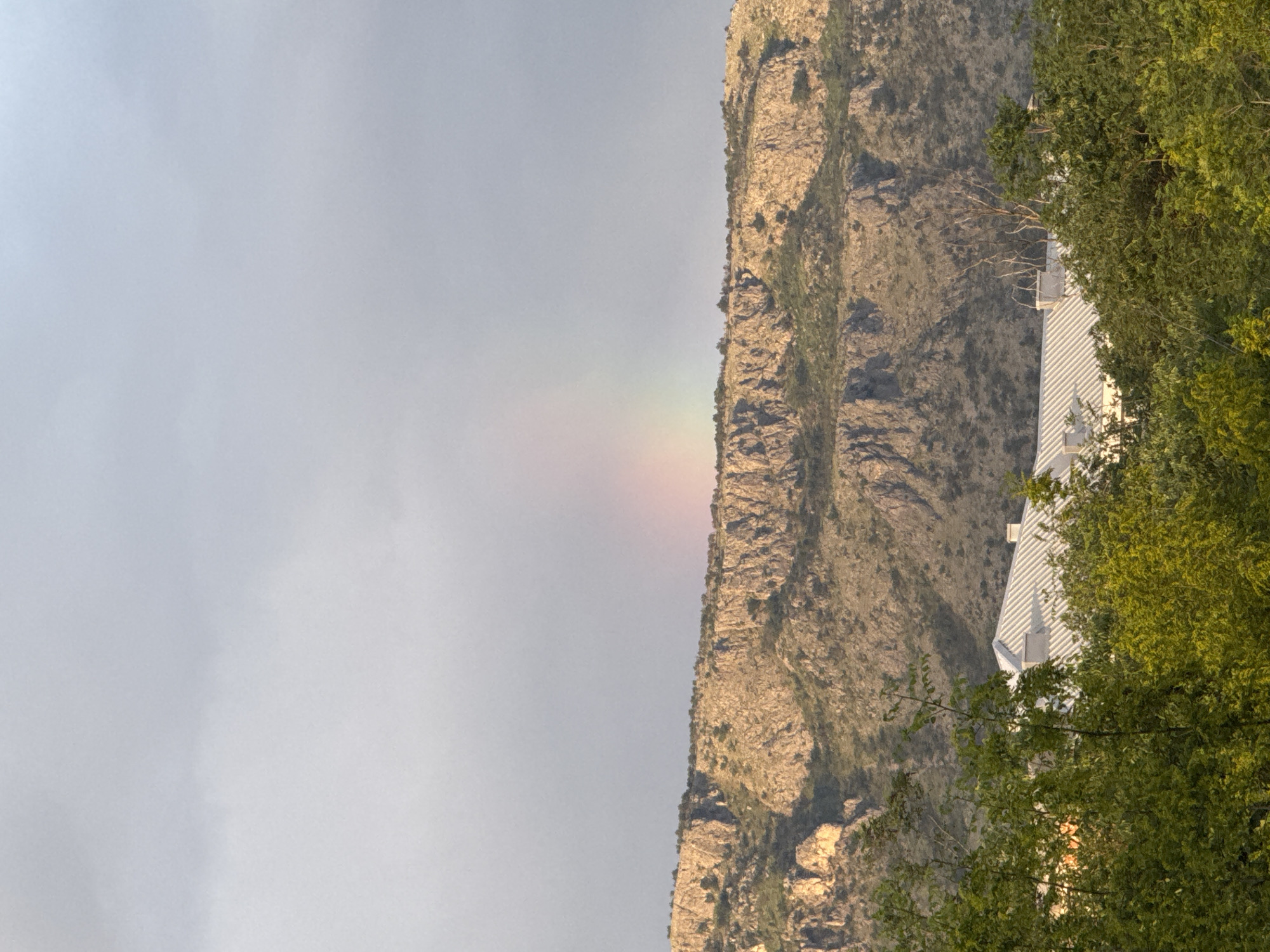 Rainbow appears over Podgorica mountains amid mixed skies