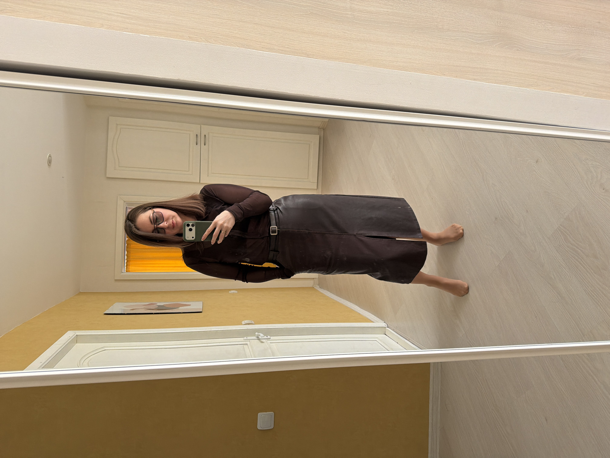 Woman photographed indoors and outdoors in early morning Izhevsk