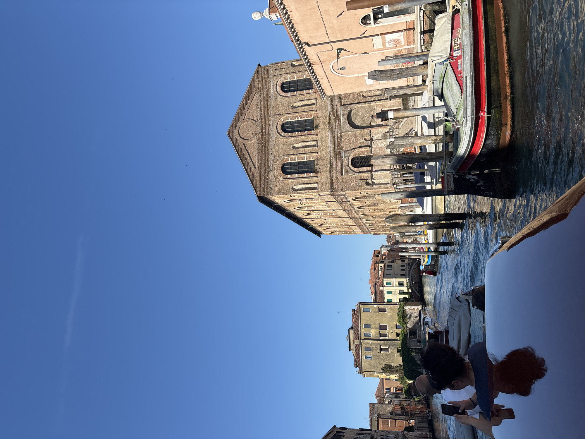 Venice canal scenes captured during sunny morning boat tour